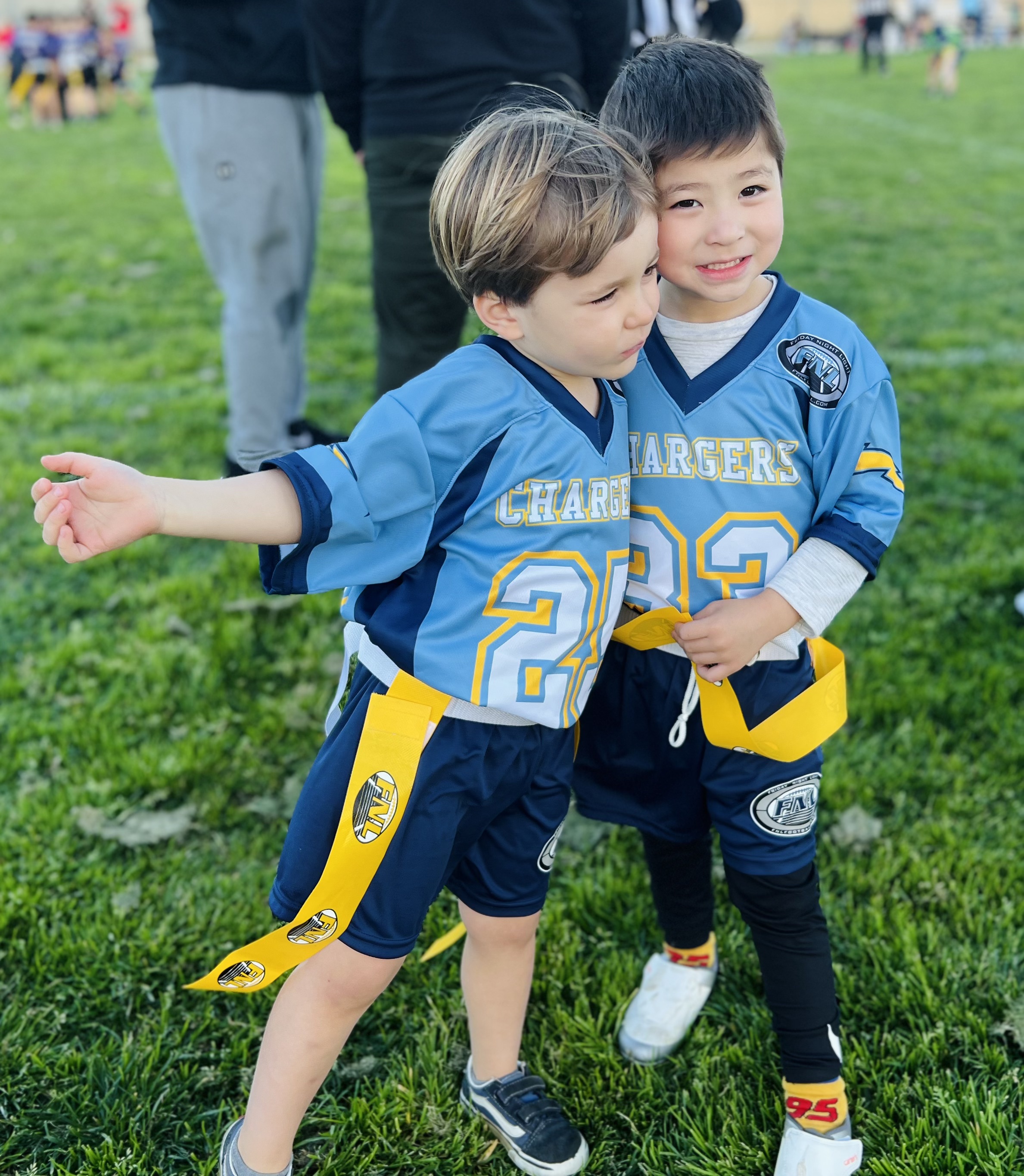 Img: people, person, grass, shorts, pants, soccer ball, boy, child, male, shoe
