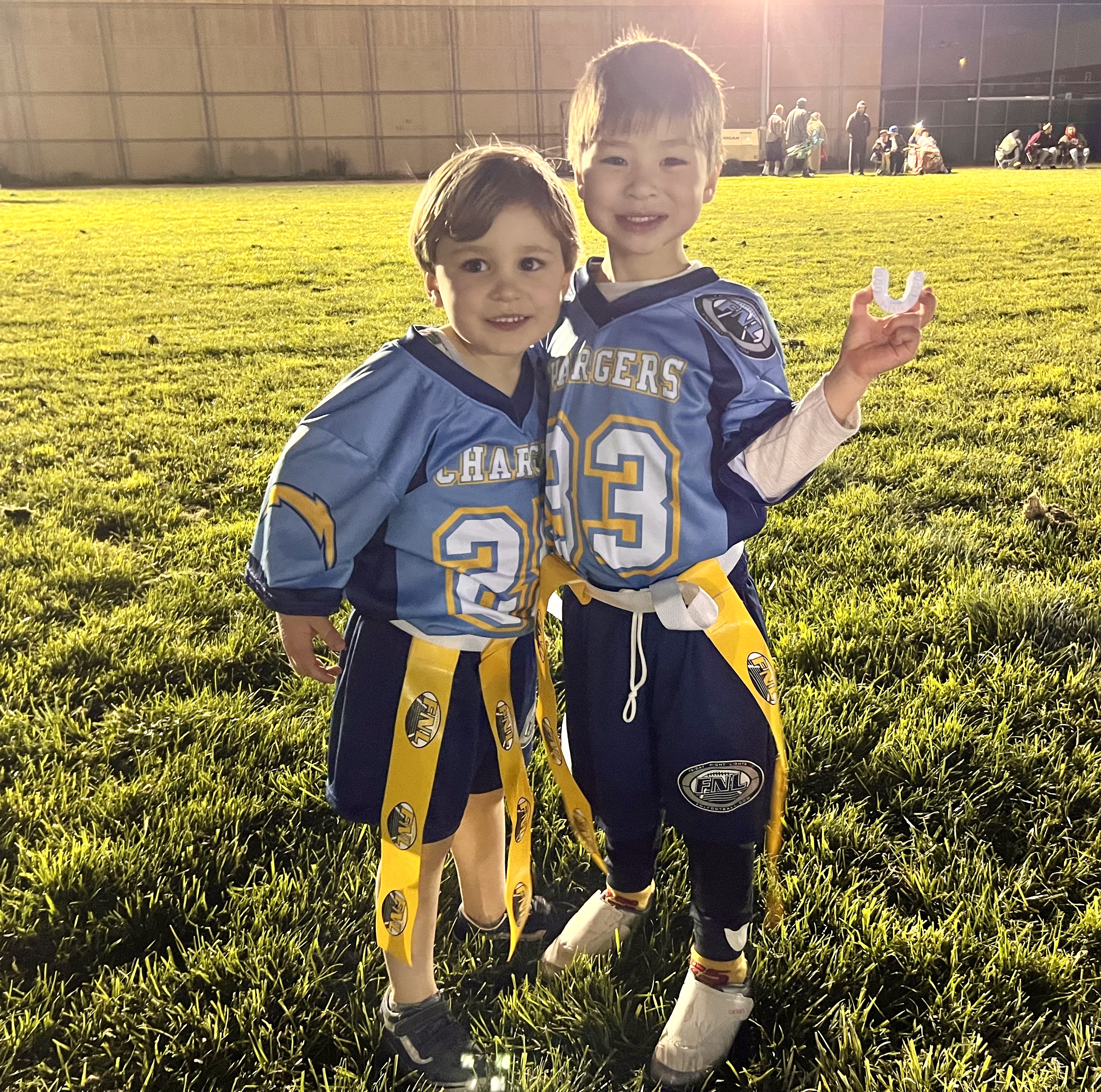 Img: face, person, portrait, grass, soccer ball, boy, child, male, people, field