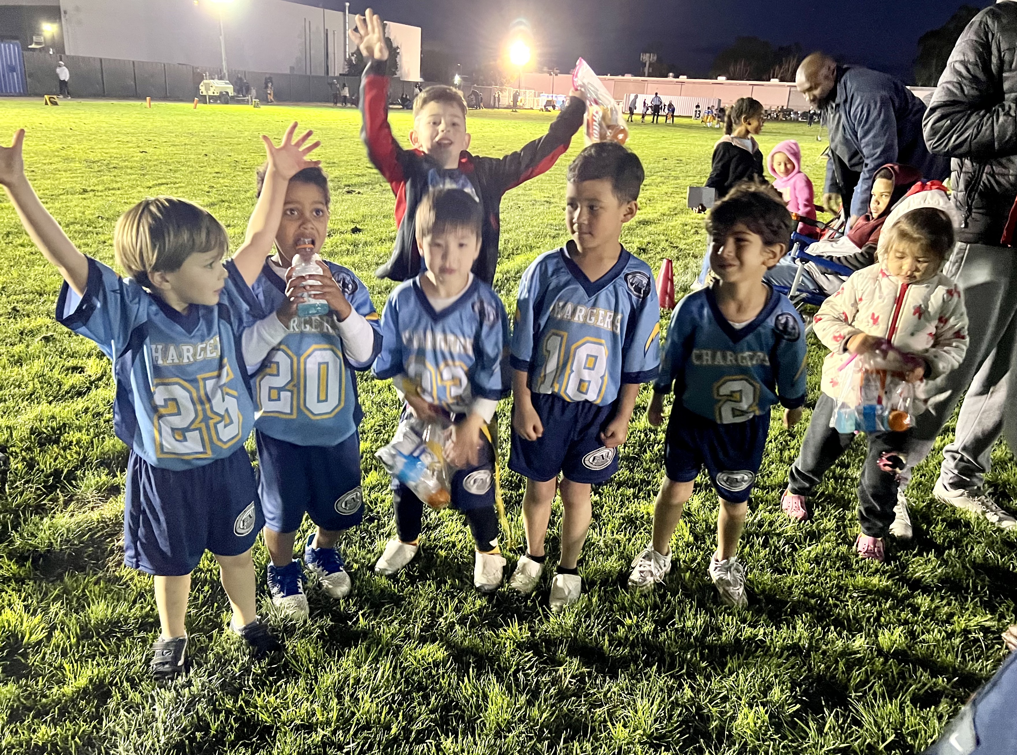 Img: people, person, grass, adult, male, man, boy, child, shoe, girl