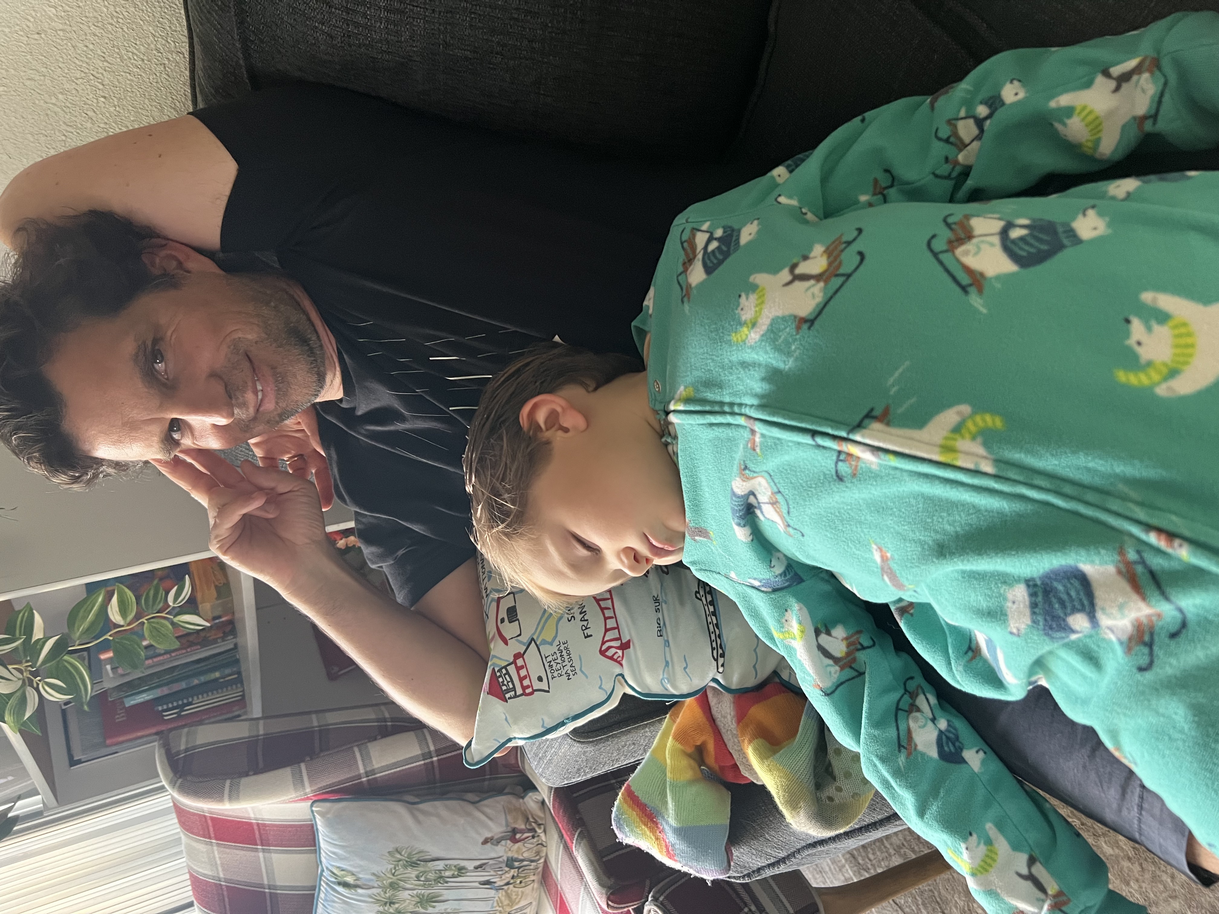 Img: person, photography, portrait, couch, cushion, home decor, blanket, baby, adult, man