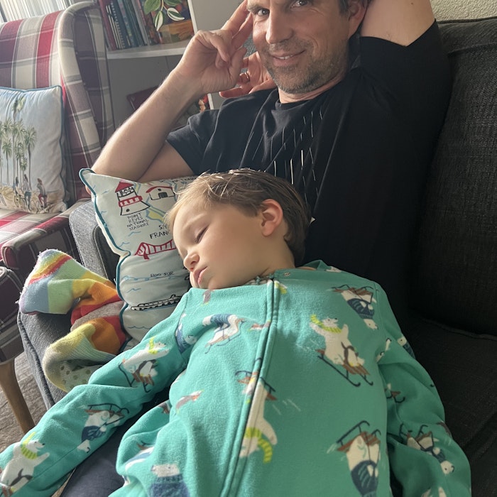 Img: person, photography, portrait, couch, cushion, home decor, blanket, baby, adult, man