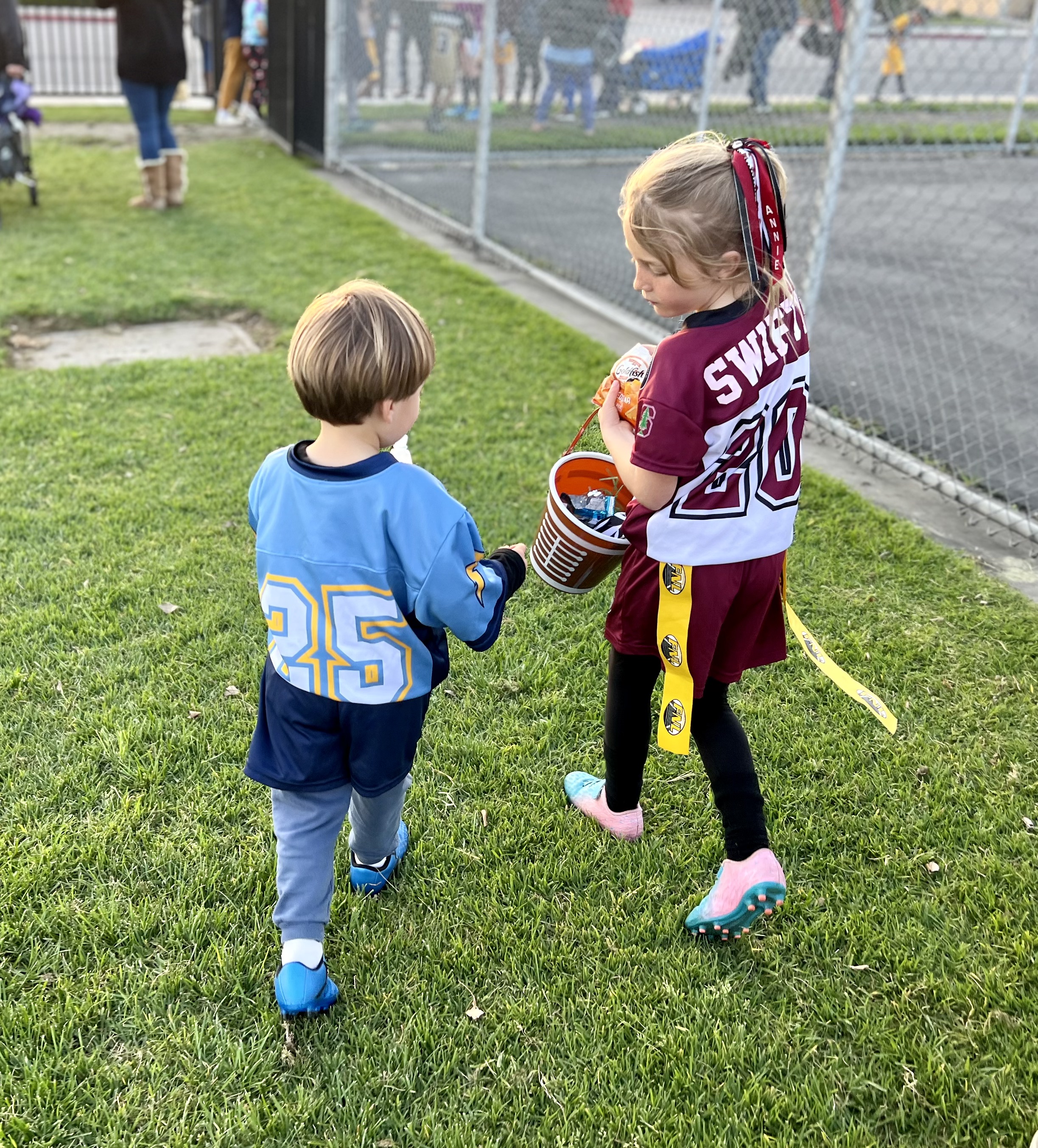 Img: boy, child, male, person, female, girl, shoe, people, playing american football, play