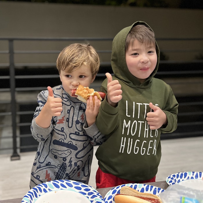 Img: person, body part, finger, hand, head, photography, portrait, food, hot dog, eating