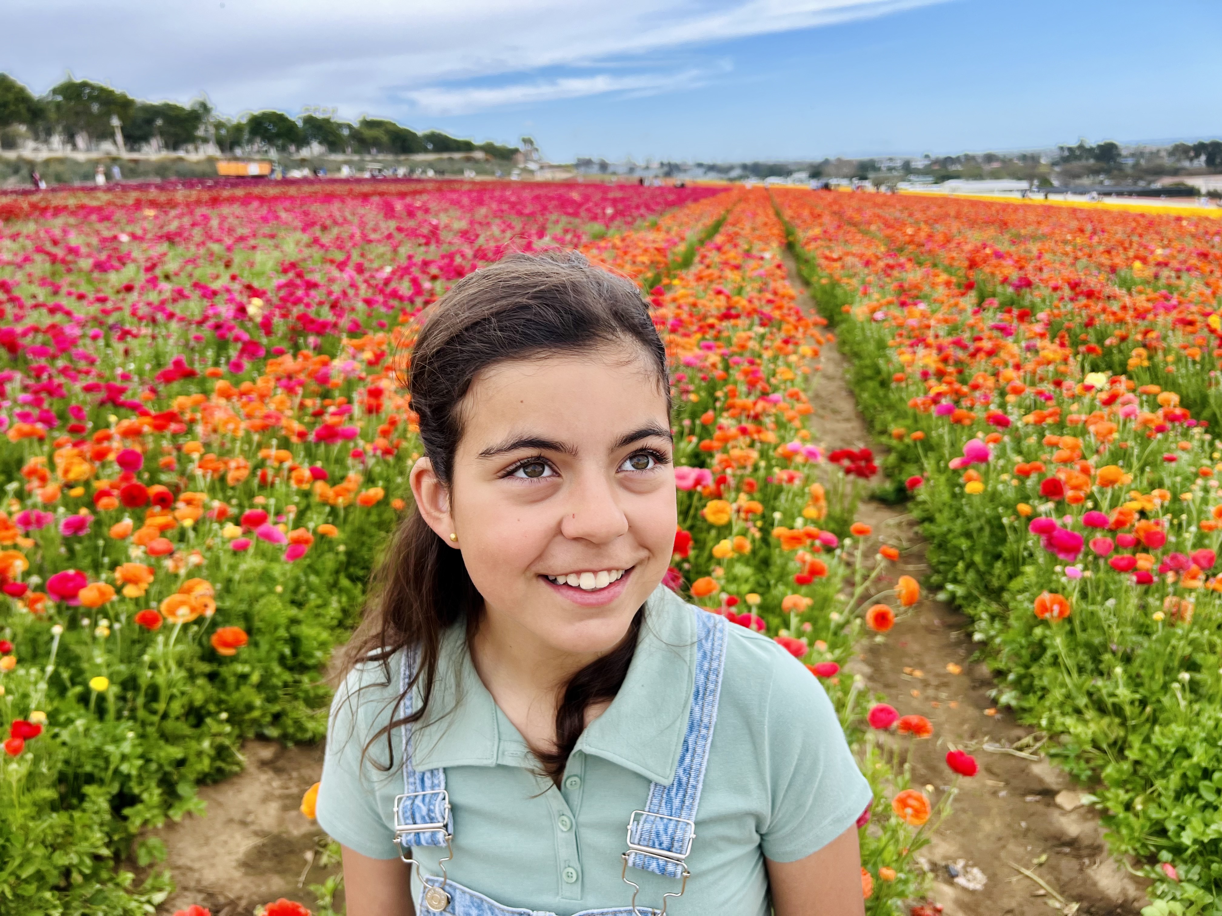 Img: face, head, person, photography, portrait, flower, smile, field, petal, grassland