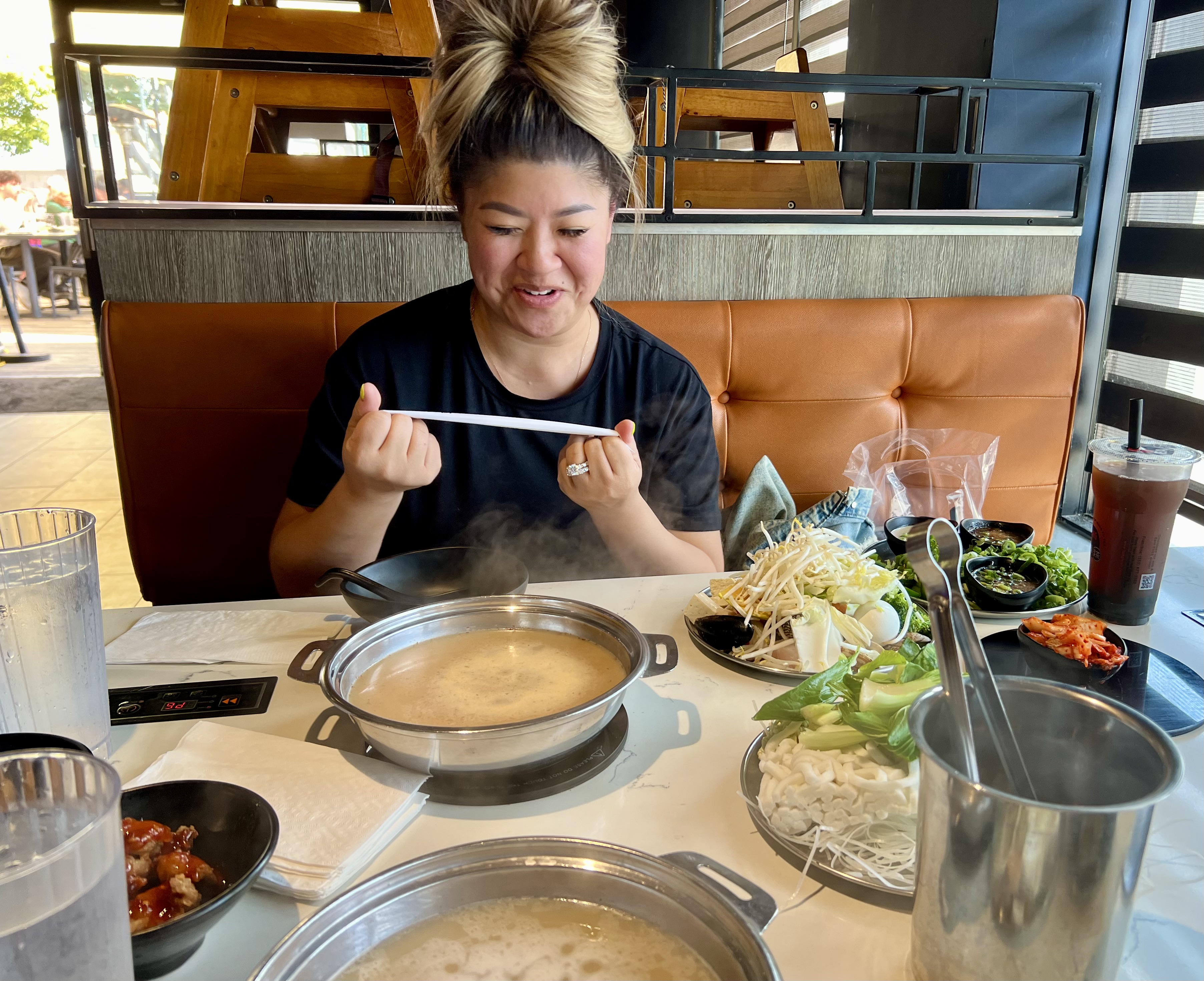 Img: food, meal, lunch, dish, dining table, restaurant, stew, person, eating, disposable cup