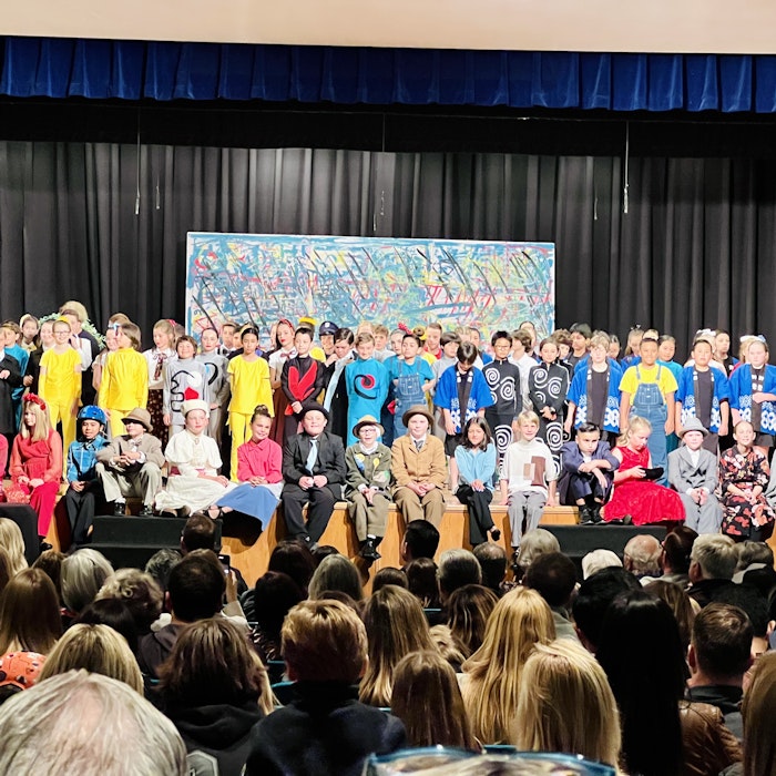 Img: people, person, crowd, classroom, school, adult, female, woman, child, girl