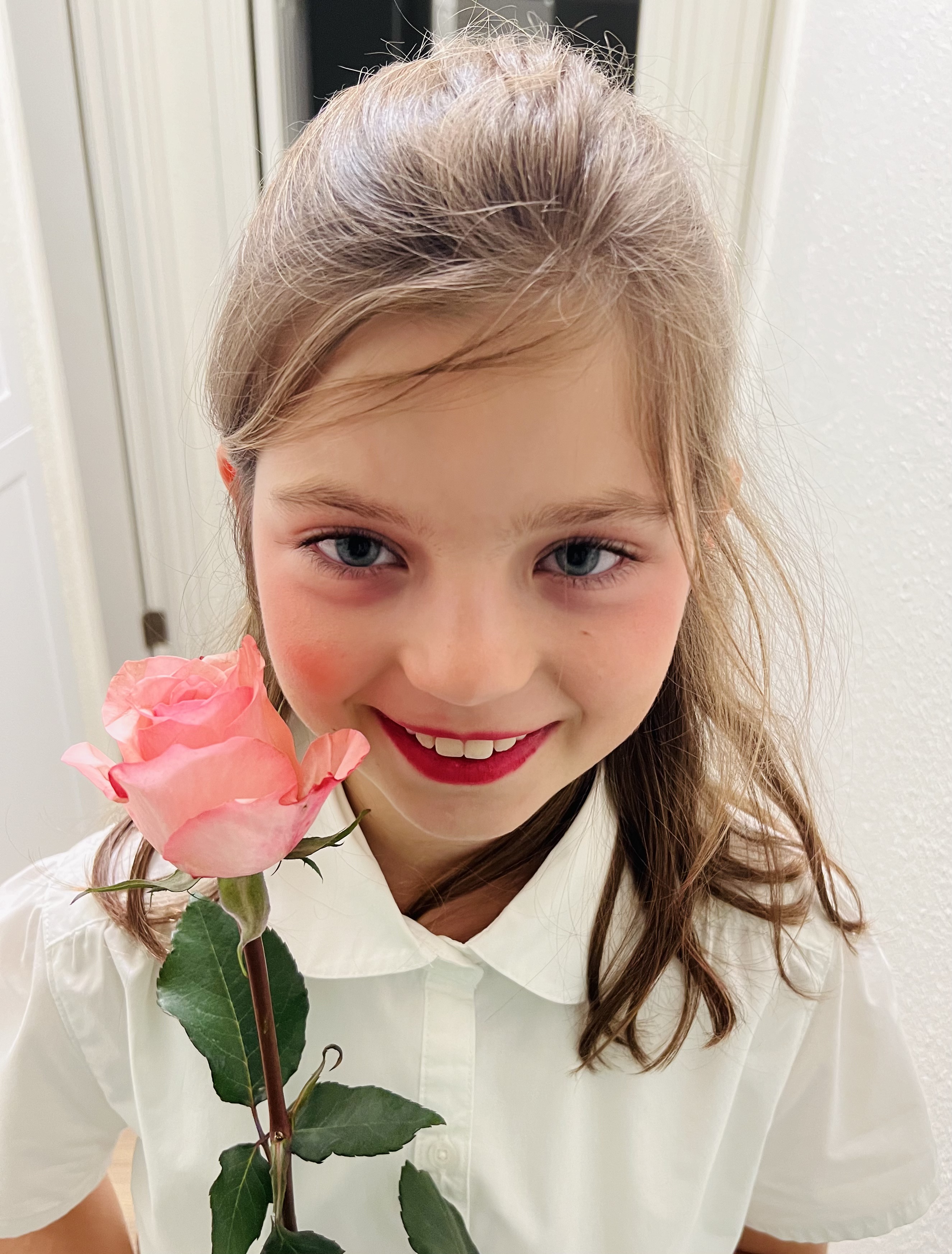 Img: flower, rose, face, head, person, portrait, smile, child, female, girl