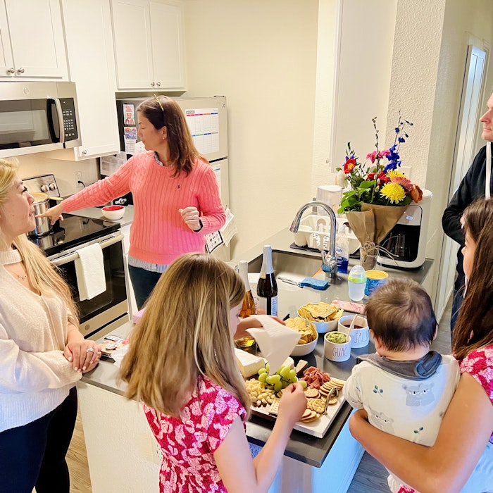 Img: adult, female, person, woman, cup, microwave, child, girl, indoors, meal