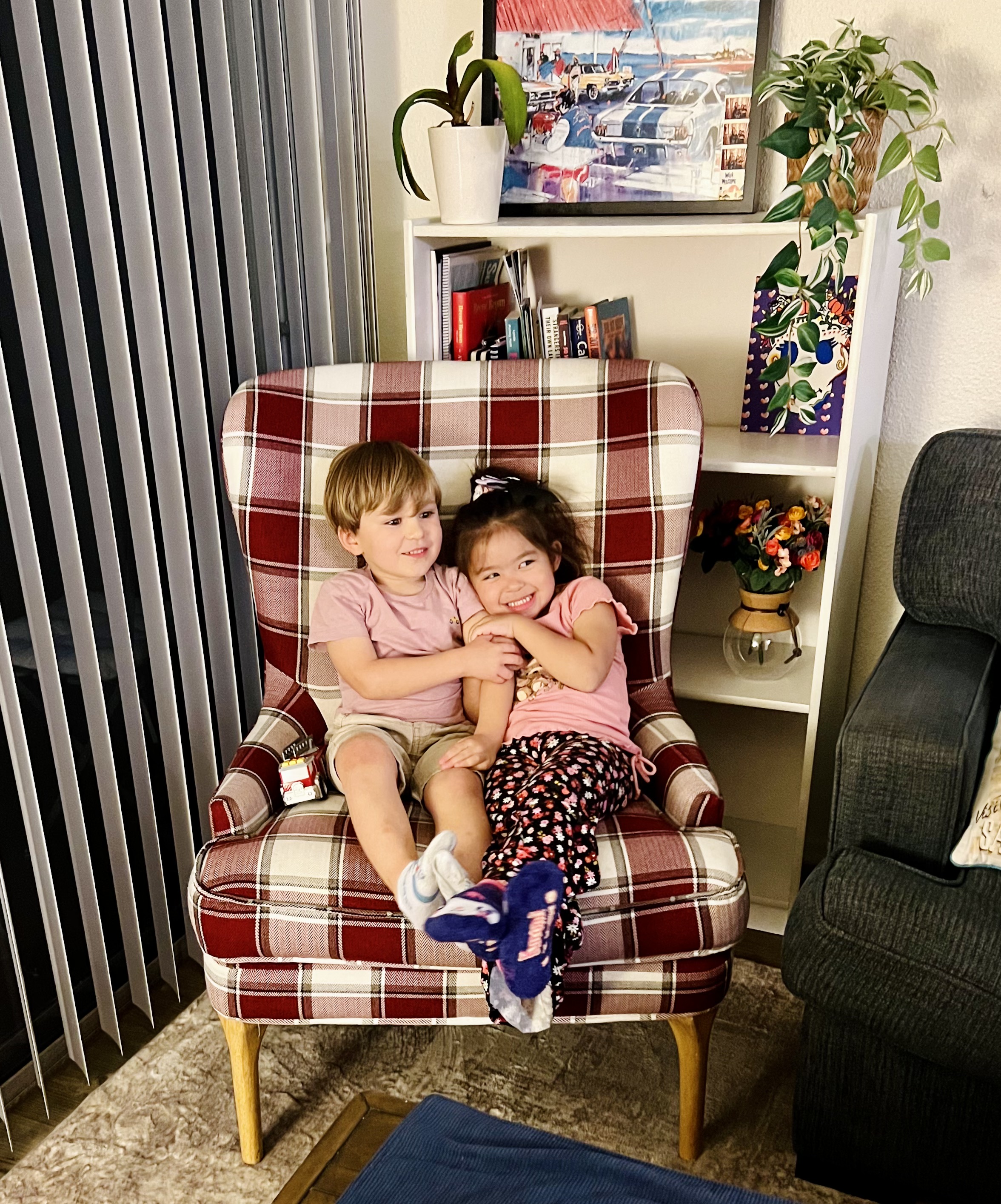 Img: person, portrait, potted plant, furniture, chair, cushion, living room, child, female, girl