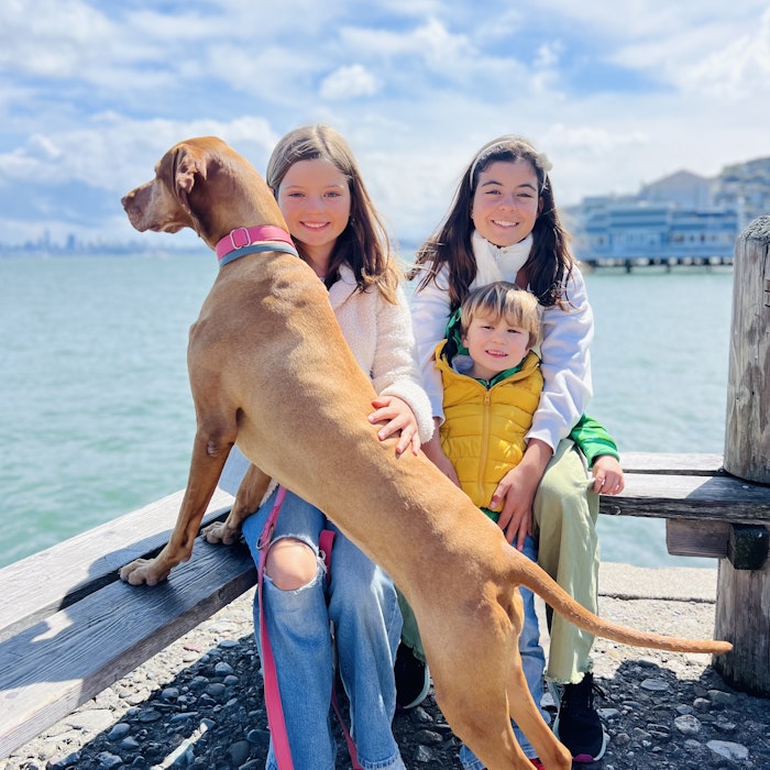 Img: water, waterfront, pants, pier, person, portrait, port, wood, shoe, jeans