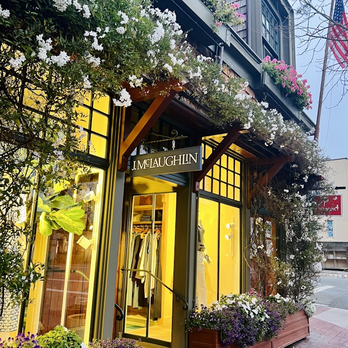 Img: potted plant, planter, pottery, vase, flower, flower arrangement, city, path, person, flag