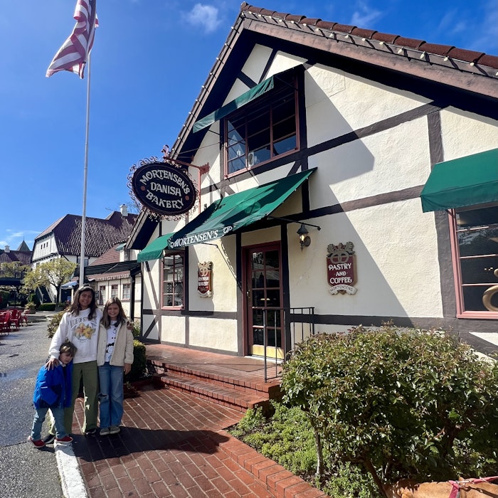 Img: shelter, flag, urban, female, girl, person, teen, shoe, path, city