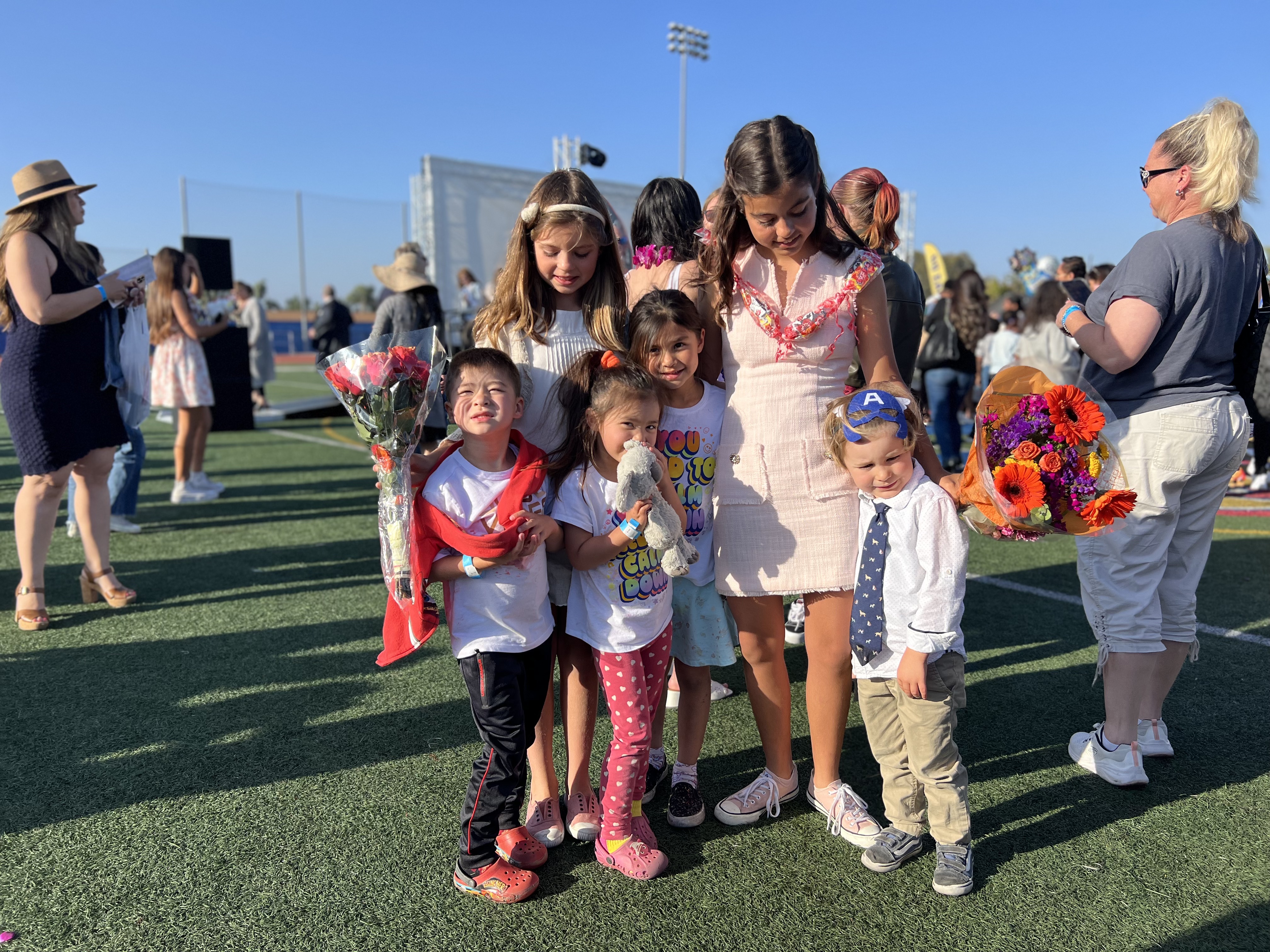 Img: people, person, flower arrangement, flower bouquet, shoe, high heel, tie, adult, female, woman