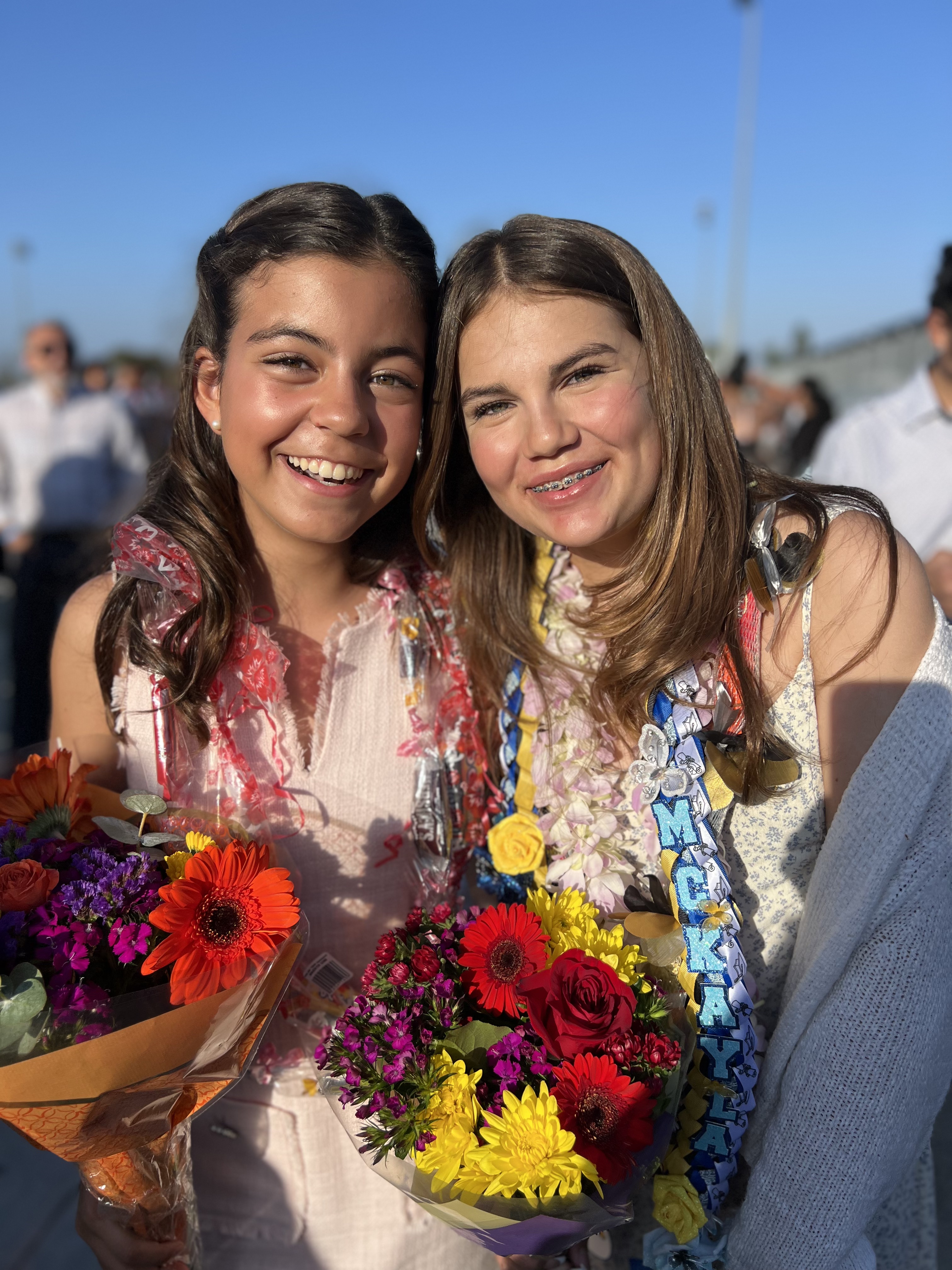 Img: flower, flower arrangement, flower bouquet, plant, person, face, head
