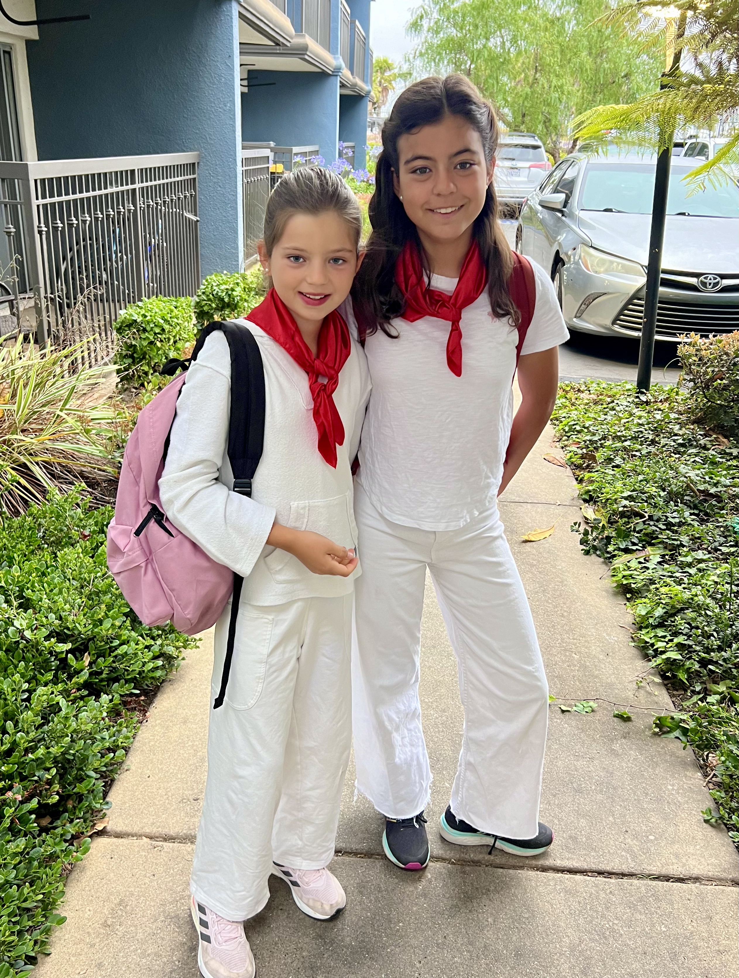 Img: female, girl, person, teen, clothing, scarf, photobombing, hair