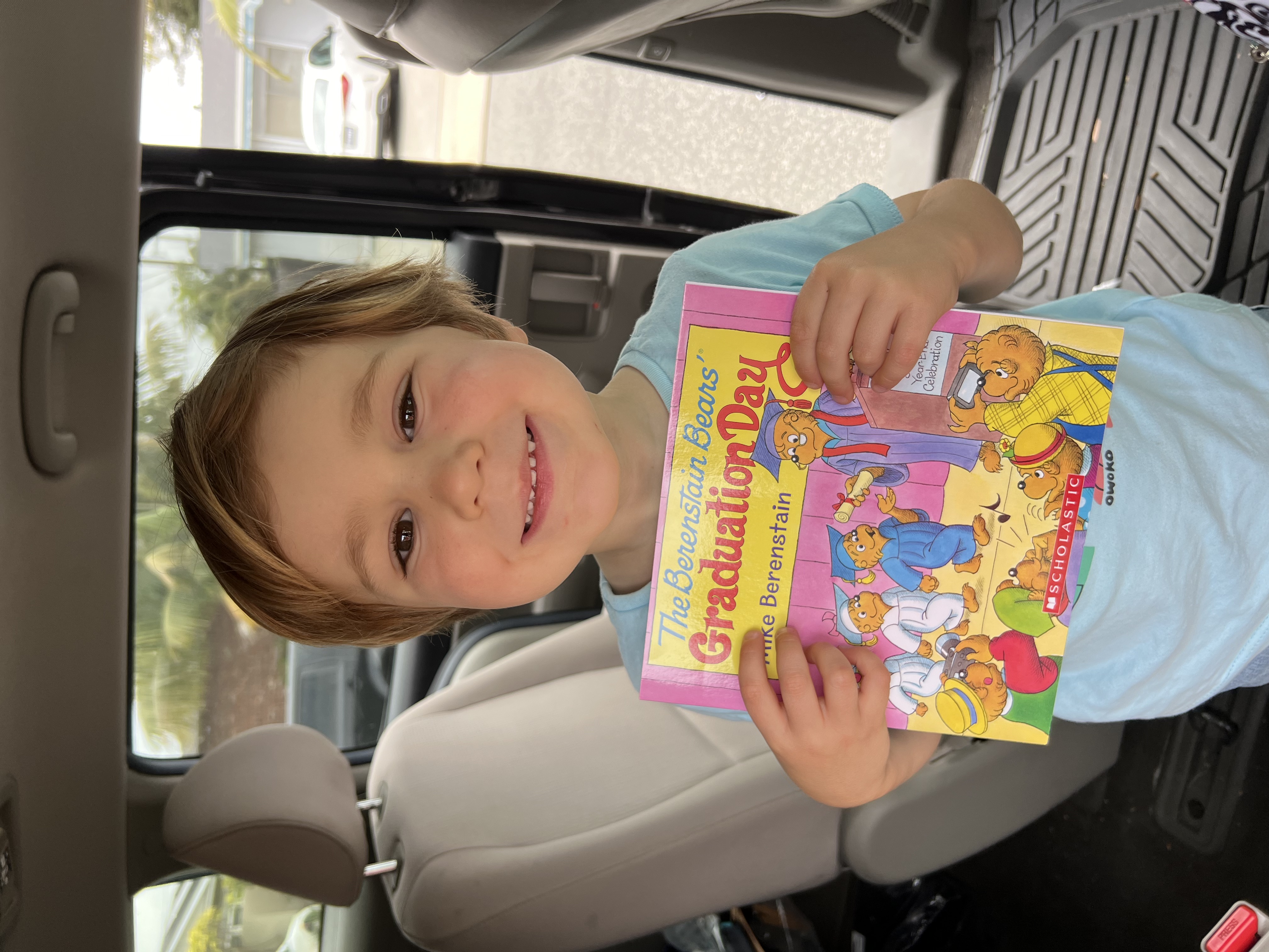 Img: cushion, home decor, t-shirt, book, publication, person, portrait, car, chair, advertisement