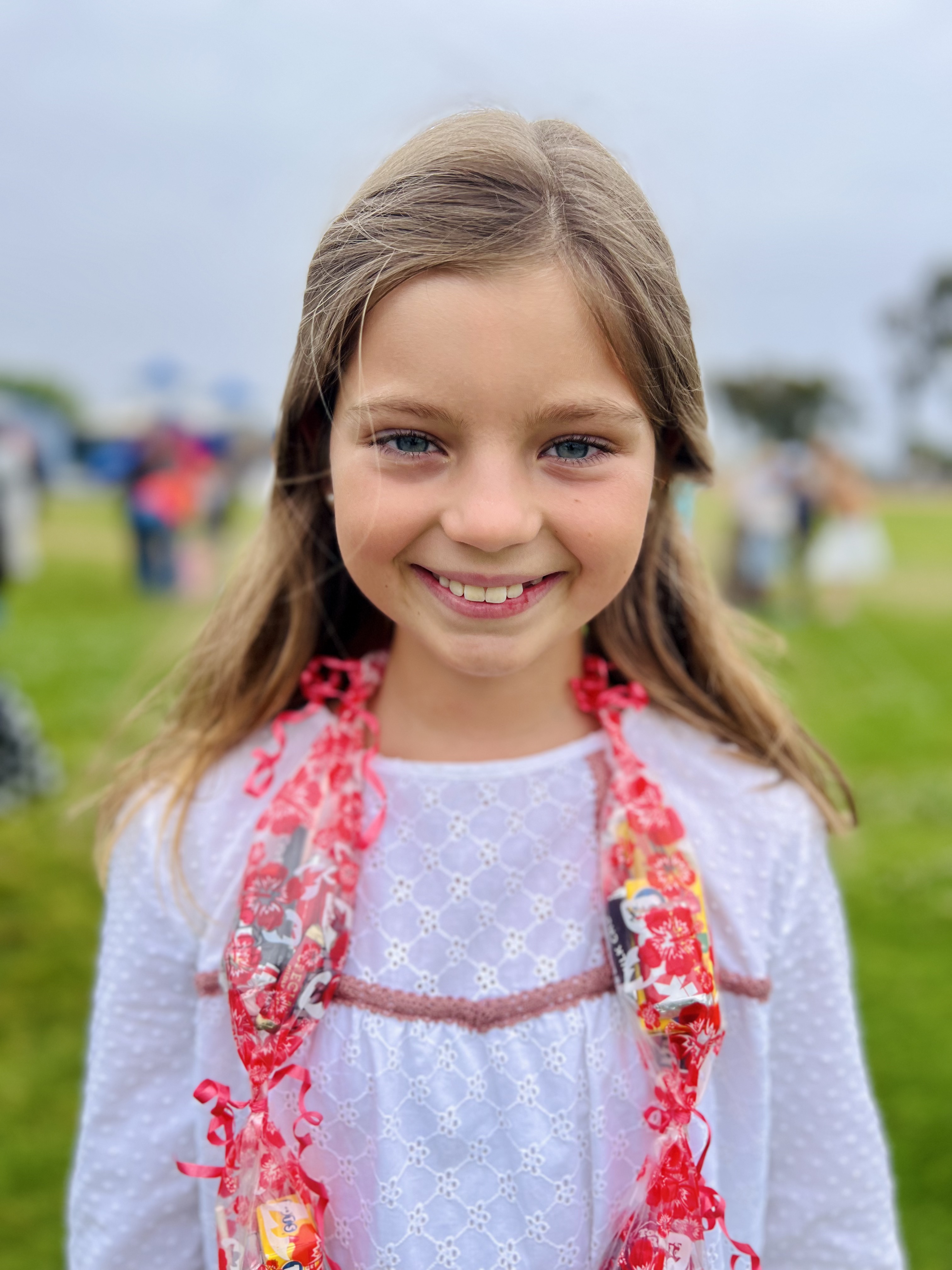 Img: face, head, person, smile, photography, portrait, flower arrangement, accessories, child, girl