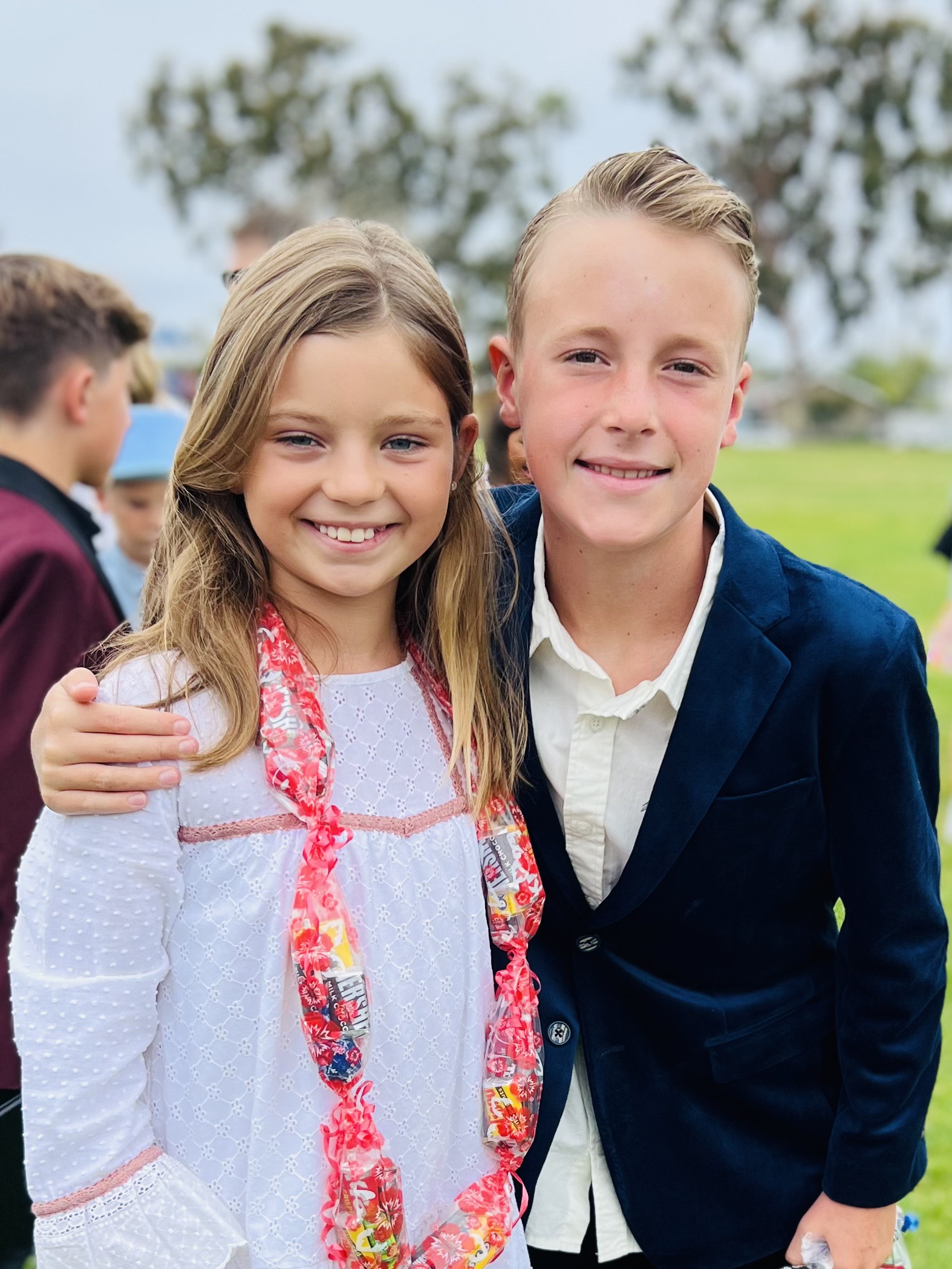 Img: blazer, coat, jacket, face, photography, portrait, smile, formal wear, suit, tie