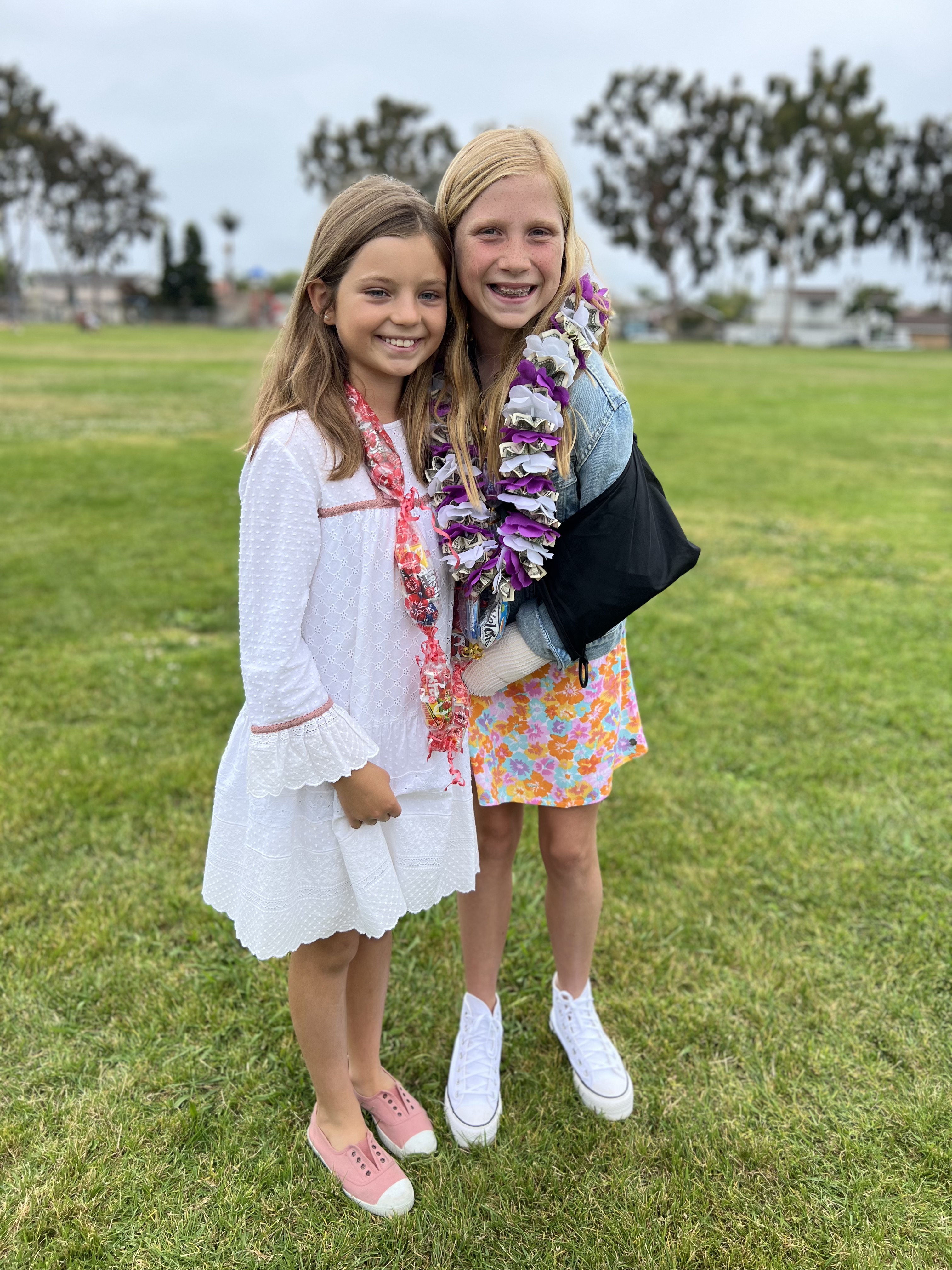 Img: grass, flower, flower arrangement, person, portrait, child, female, girl, people, park