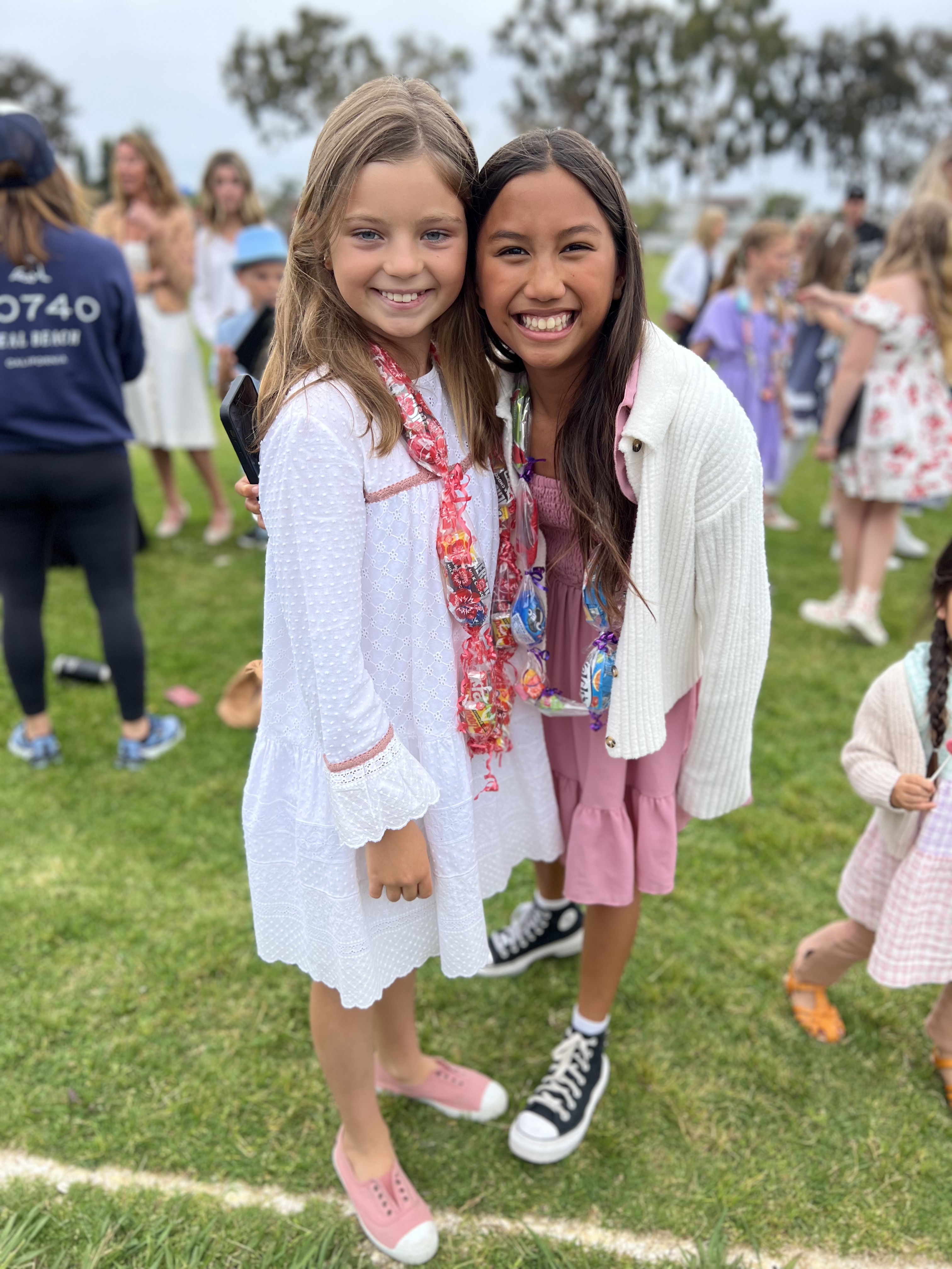 Img: shoe, grass, people, person, smile, child, female, girl, coat, portrait