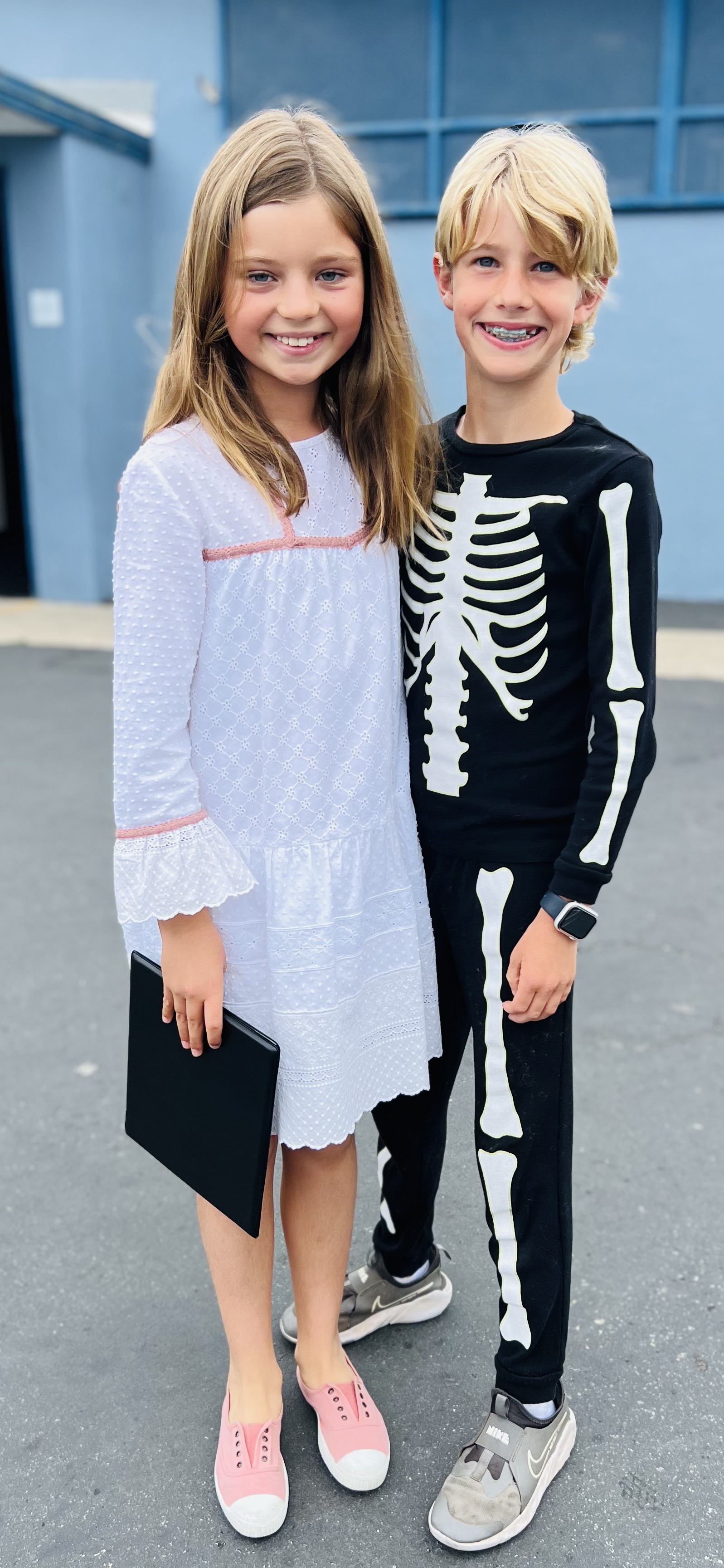 Img: clothing, footwear, shoe, long sleeve, sleeve, person, sneaker, pants