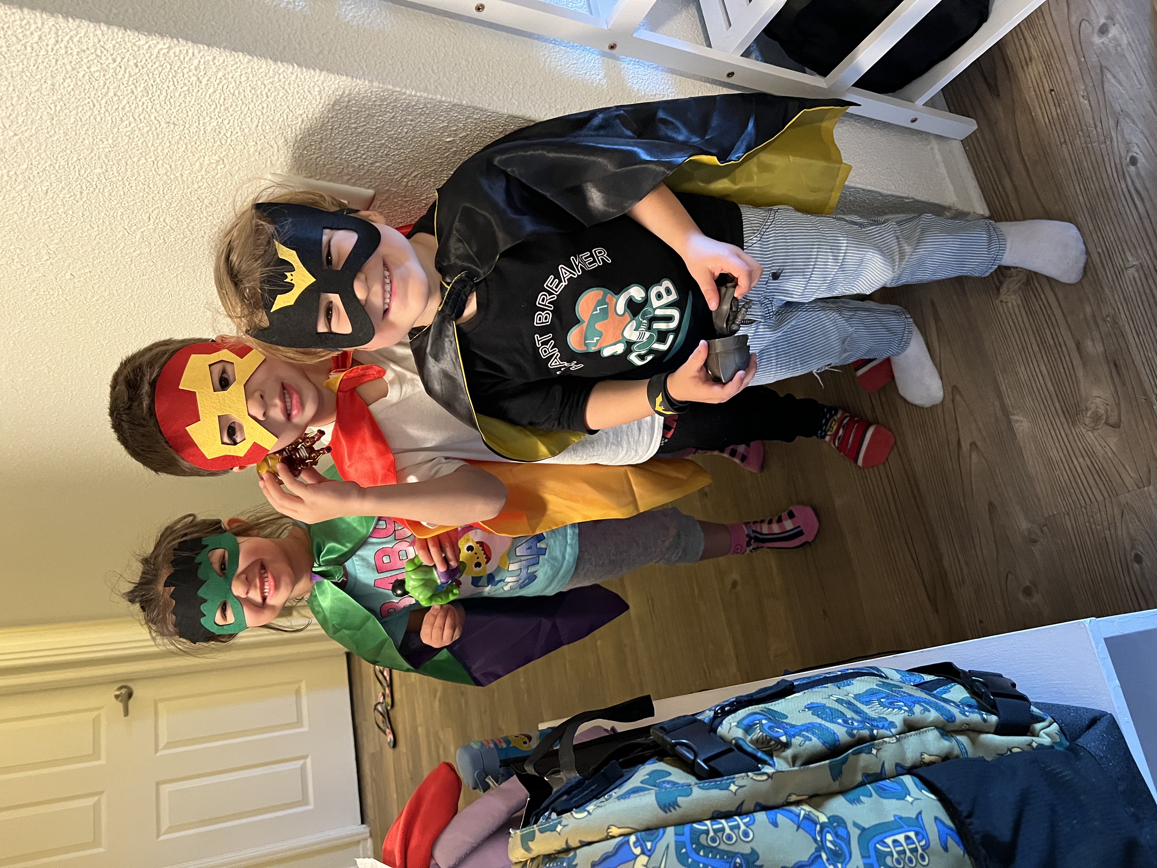 Img: pants, costume, person, floor, flooring, portrait, jeans, t-shirt, sock, shoe