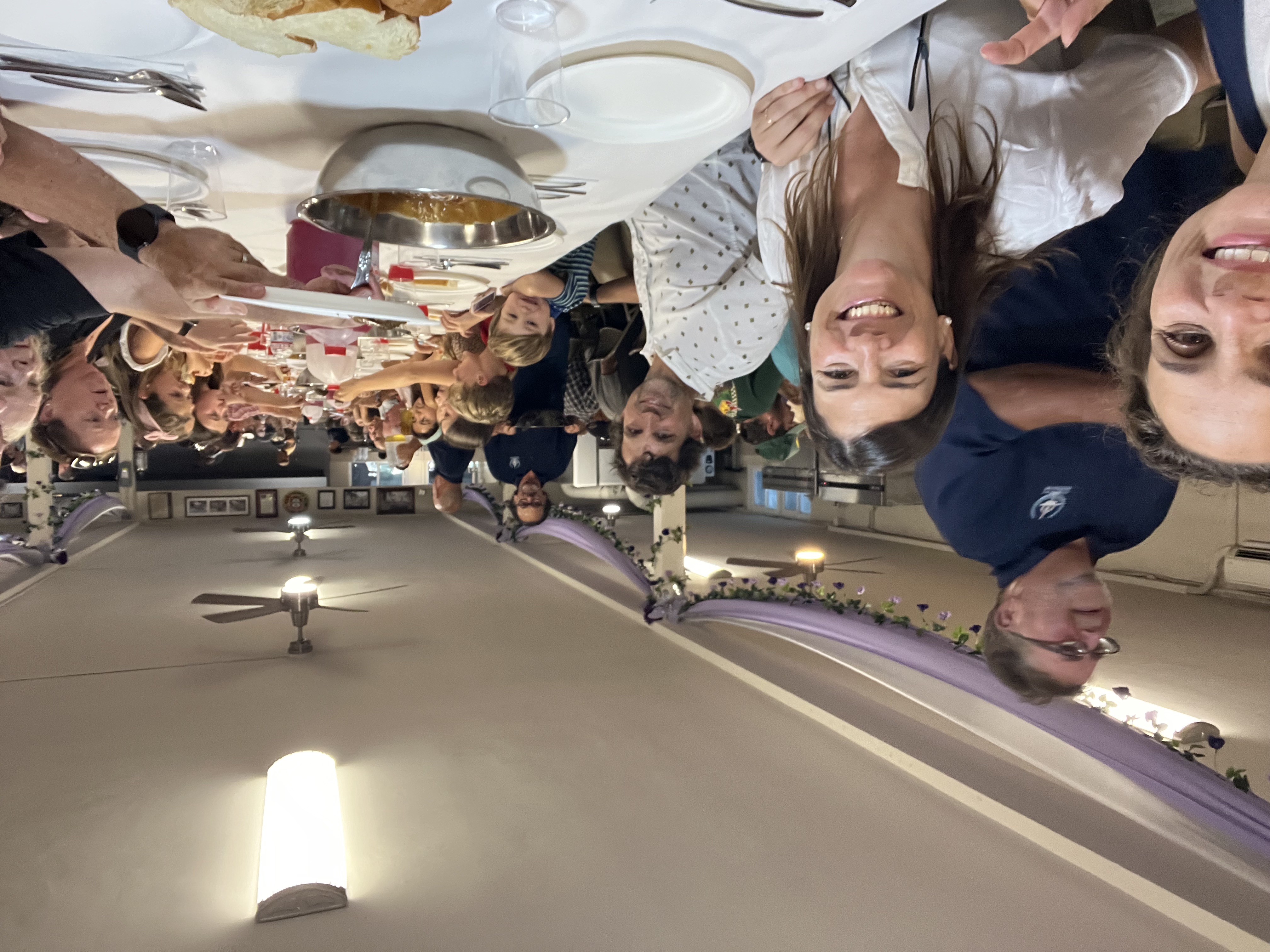 Img: restaurant, adult, female, person, woman, hat, cafeteria, cup, glasses, lamp