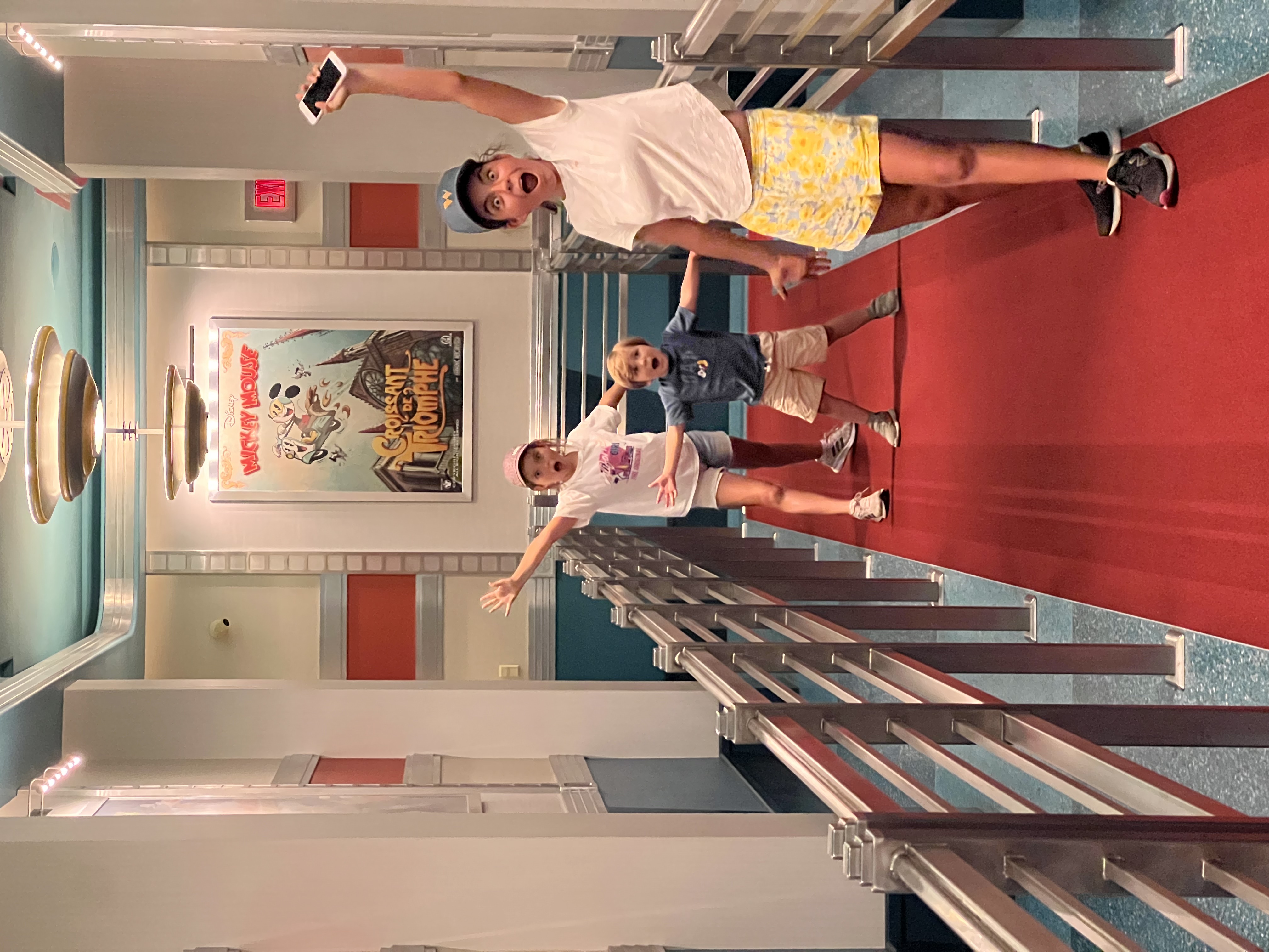 Img: footwear, shoe, boy, child, male, person, shorts, head, face, photobombing