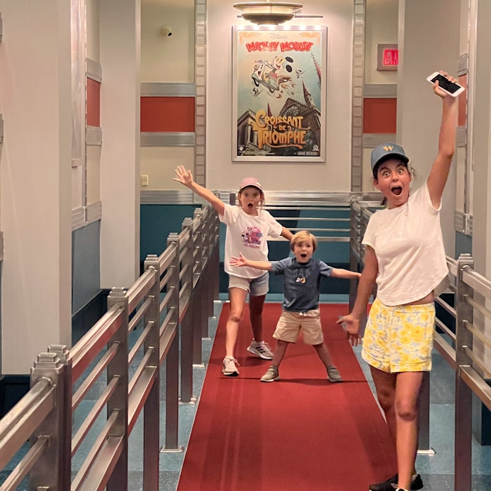 Img: footwear, shoe, boy, child, male, person, shorts, head, face, photobombing