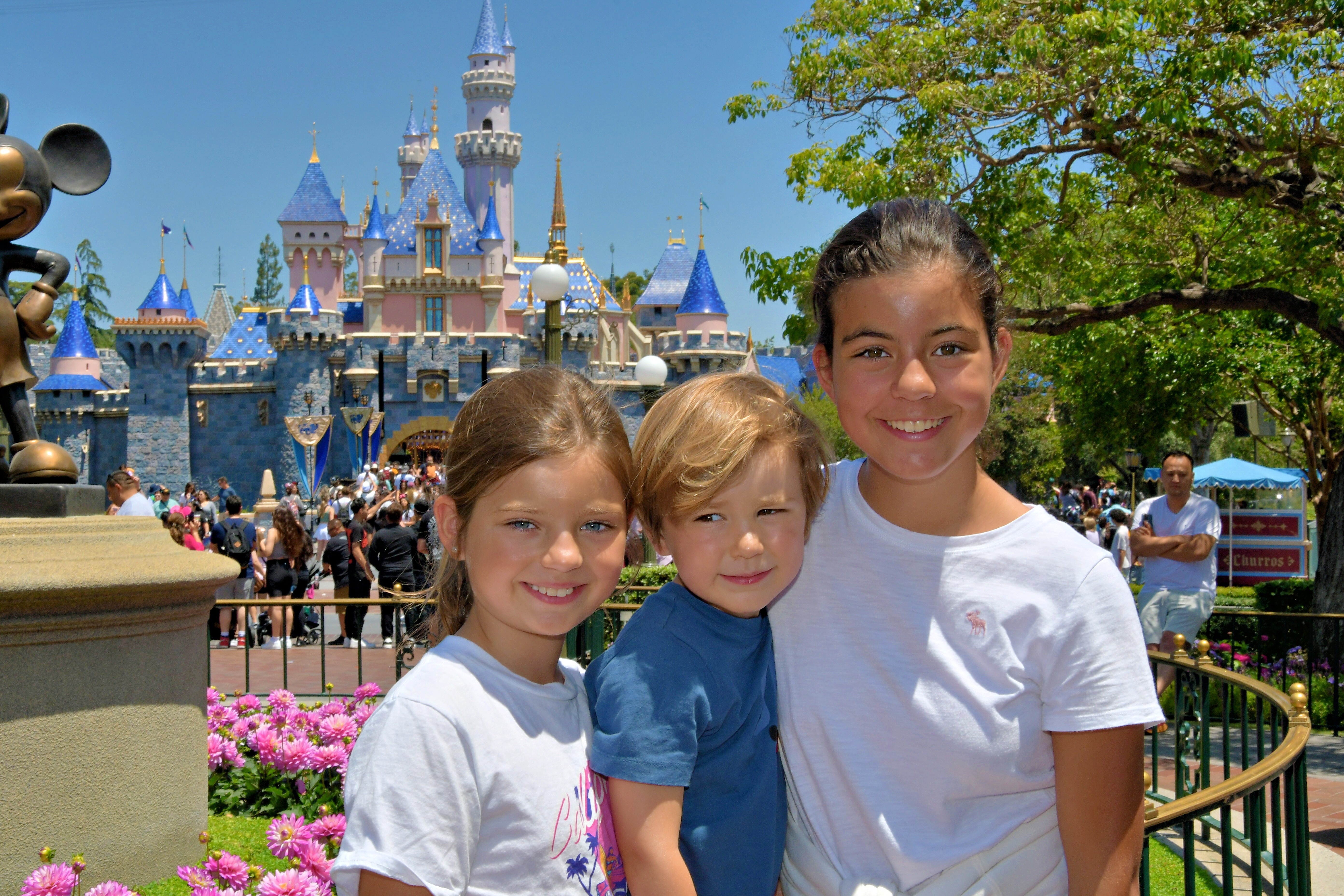 Img: amusement park, fun, theme park, t-shirt, child, female, girl, person, face, garden