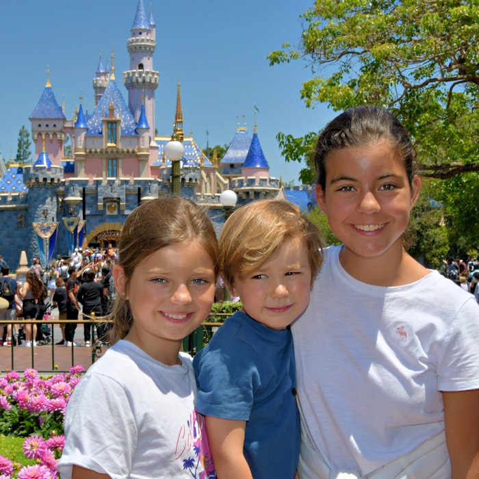 Img: amusement park, fun, theme park, t-shirt, child, female, girl, person, face, garden