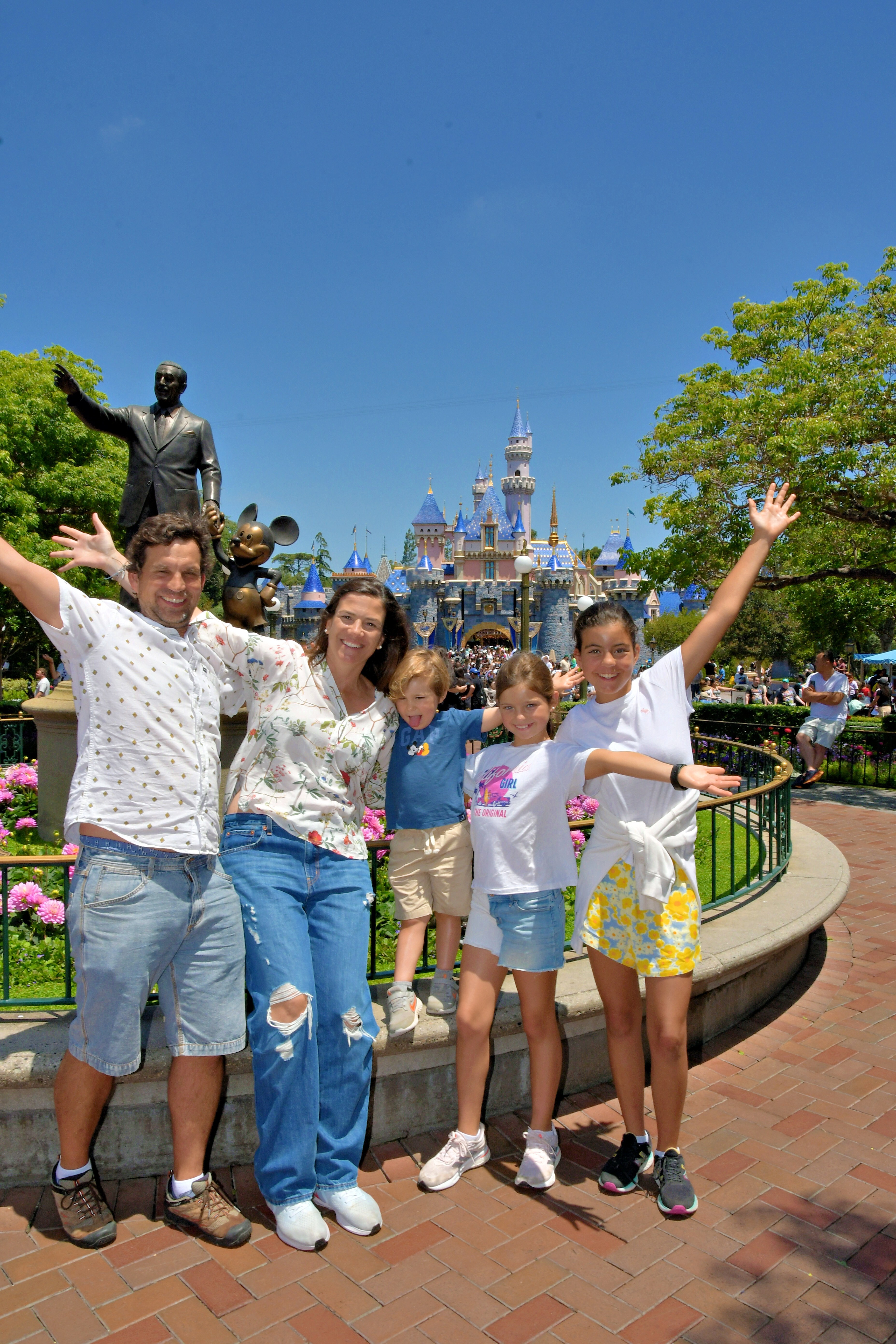 Img: shorts, pants, walkway, shoe, jeans, person, adult, male, man, glove