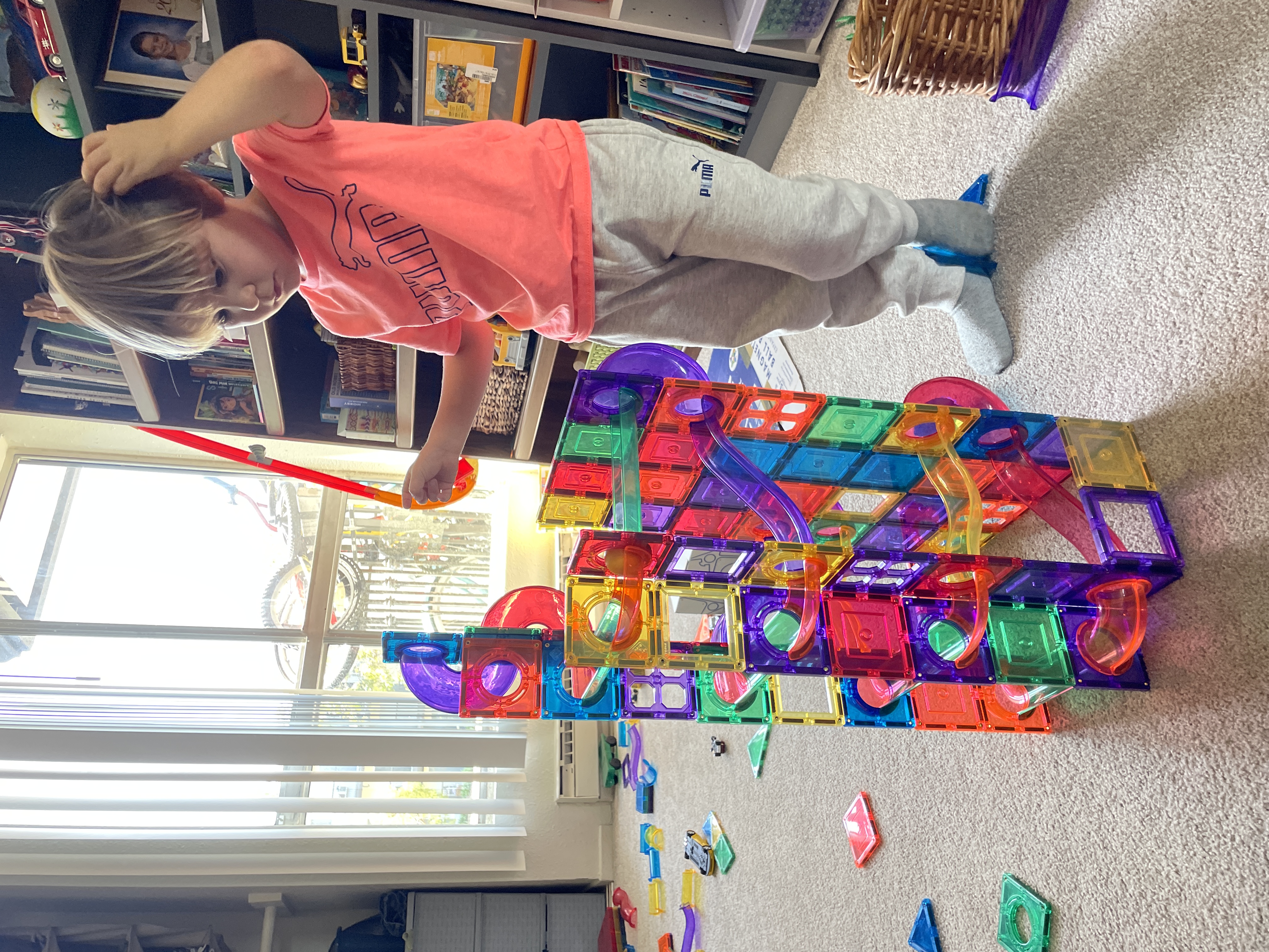 Img: shelf, person, bookcase, furniture, face, head, photography, portrait, indoors, interior design