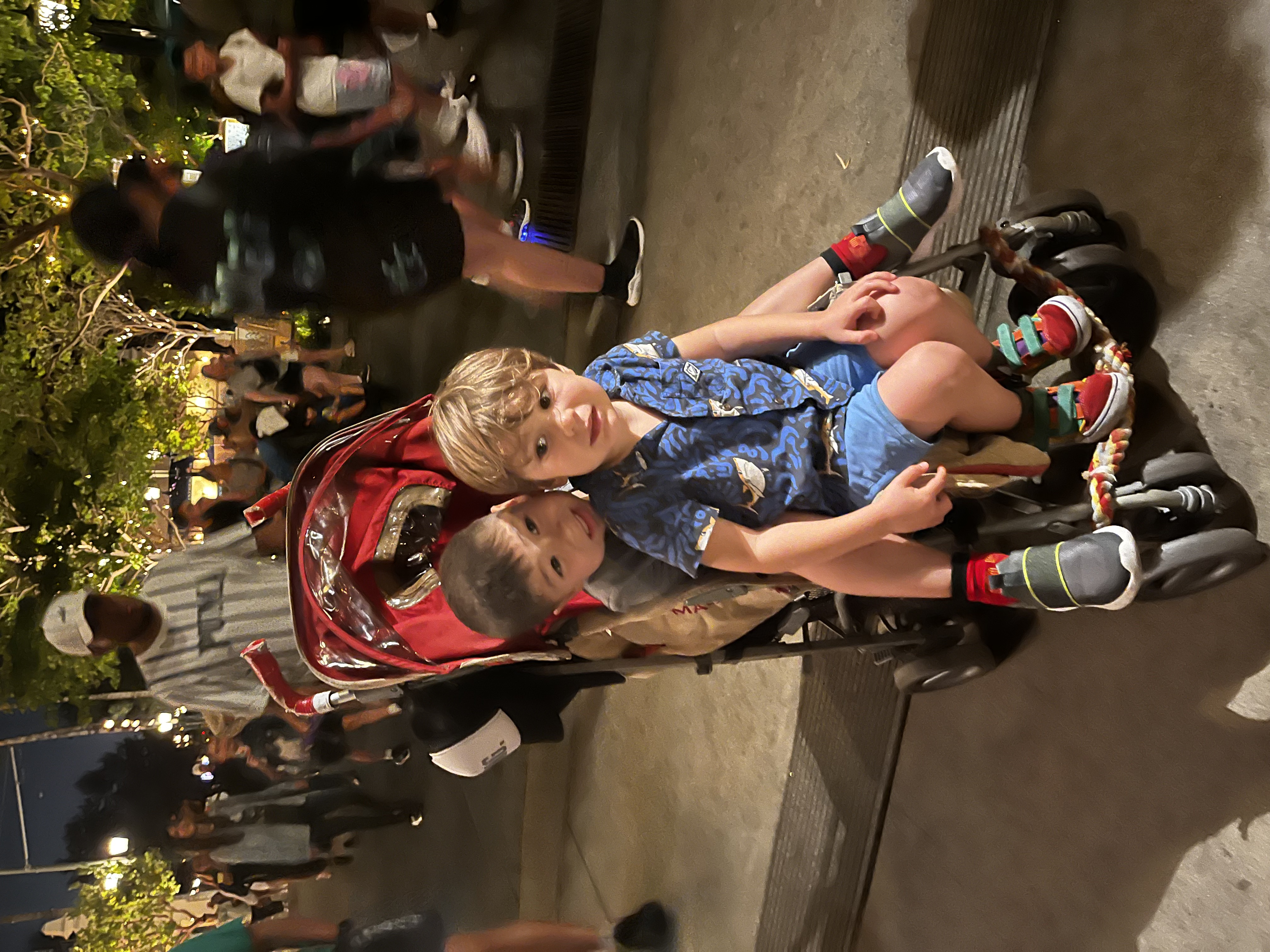 Img: shorts, boy, child, male, person, shoe, hat, stroller, handbag, face
