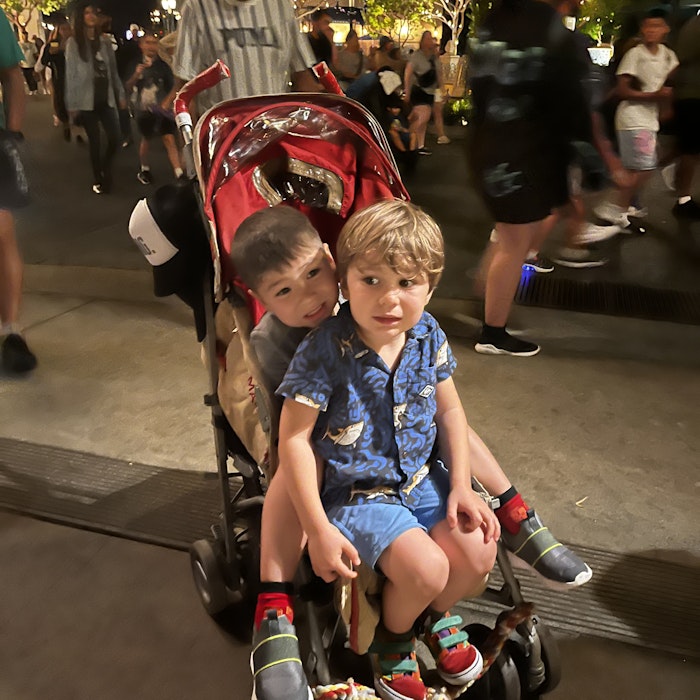 Img: shorts, boy, child, male, person, shoe, hat, stroller, handbag, face