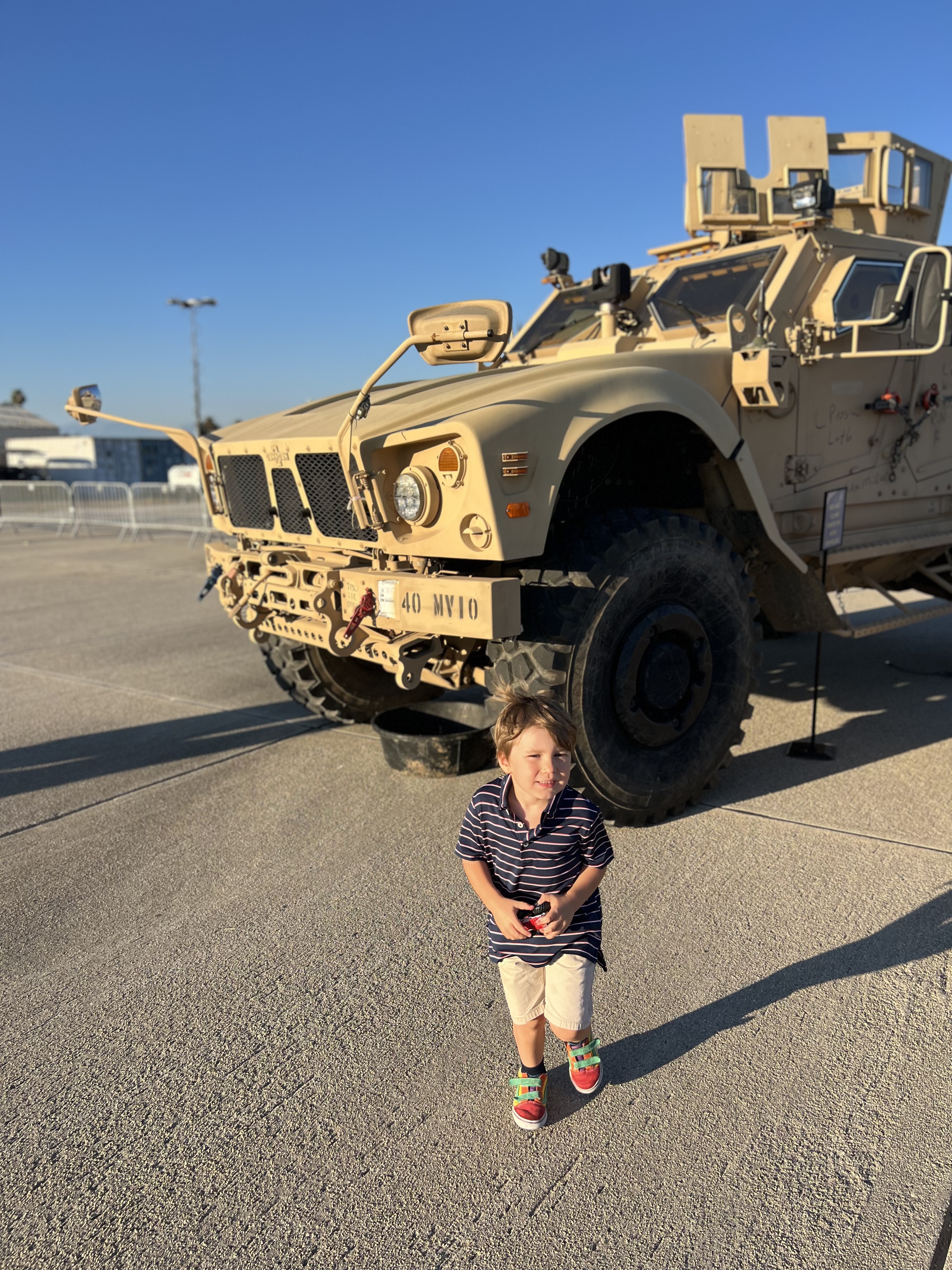 Img: photography, person, portrait, clothing, shorts, pants, wheel, shoe, military, armored