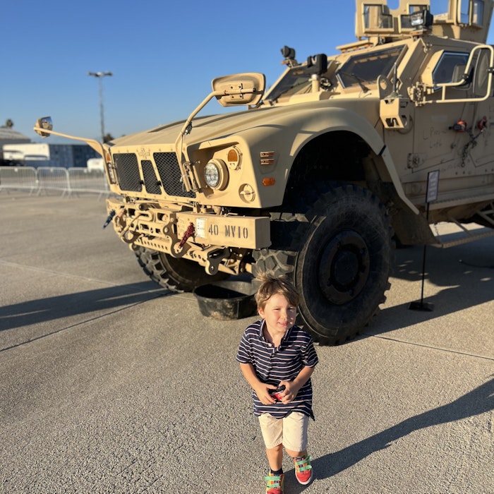 Img: photography, person, portrait, clothing, shorts, pants, wheel, shoe, military, armored