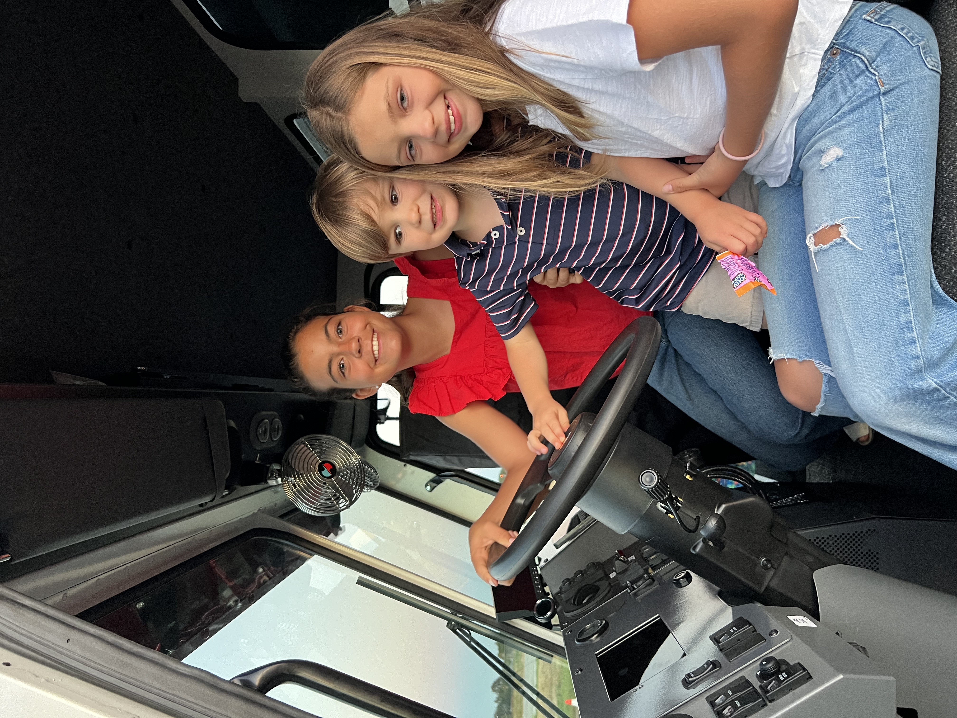 Img: pants, face, person, portrait, adult, female, woman, bracelet, shoe, vehicle