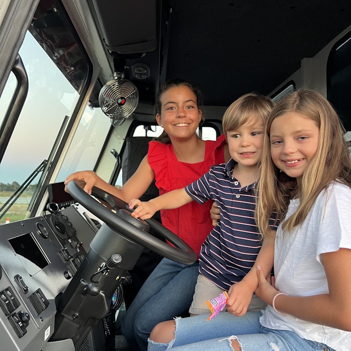 Img: pants, face, person, portrait, adult, female, woman, bracelet, shoe, vehicle
