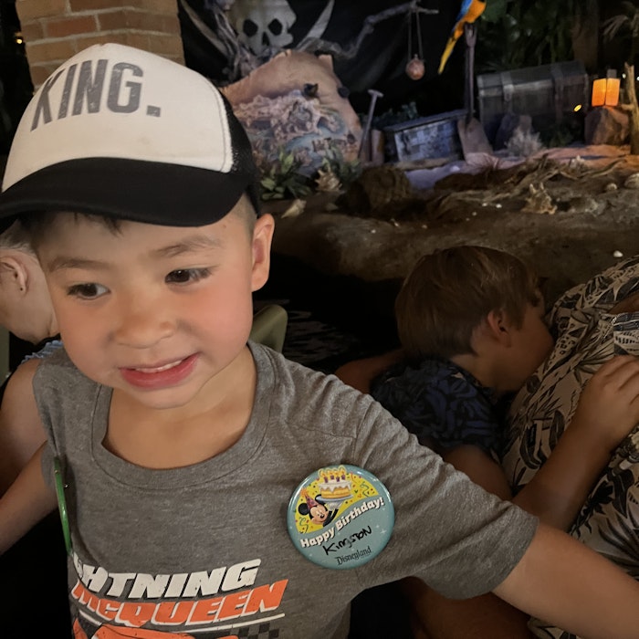 Img: baseball cap, cap, hat, t-shirt, boy, child, male, person, bird, portrait