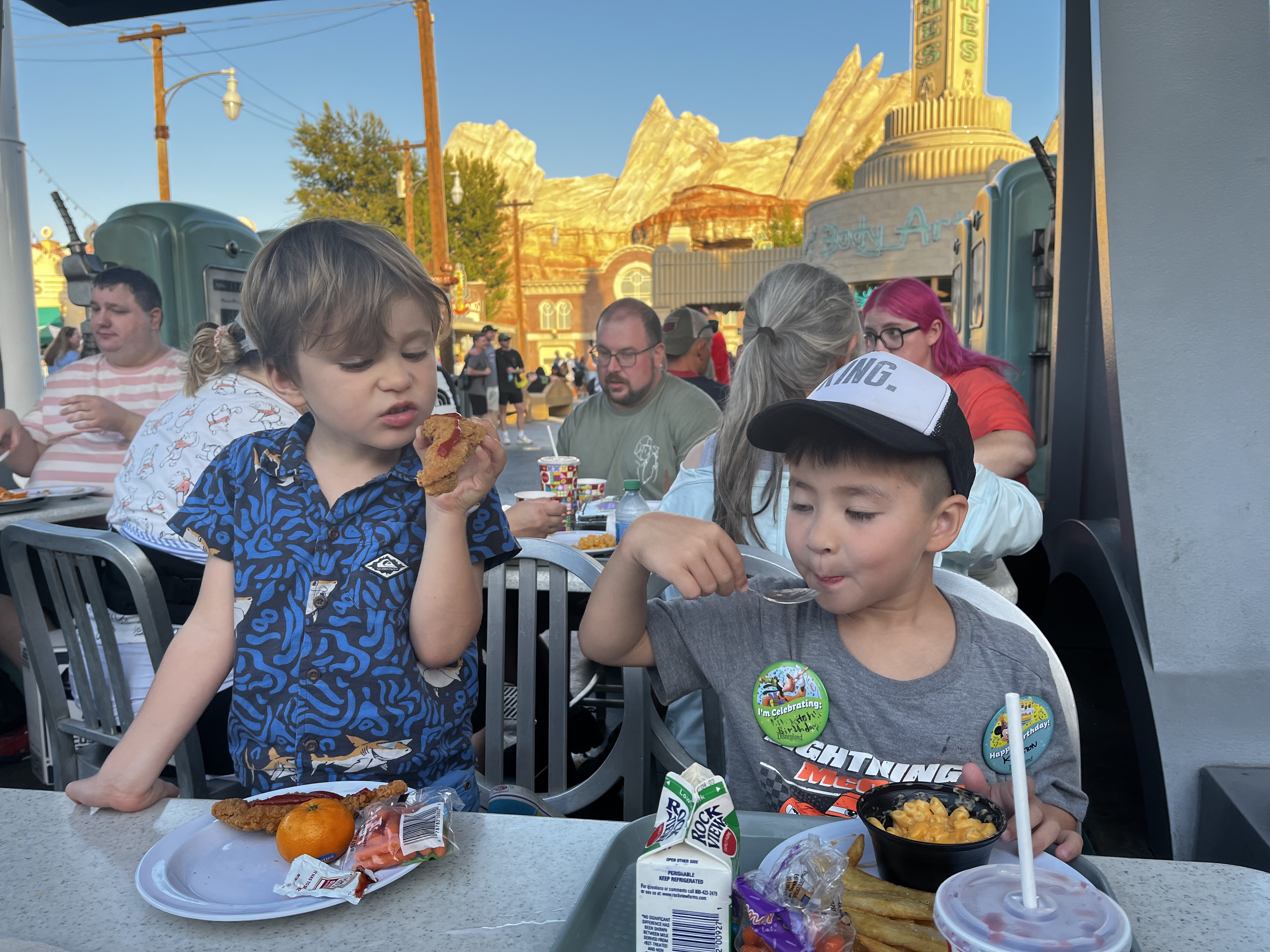 Img: lunch, restaurant, hat, adult, female, person, woman, glasses, boy, child