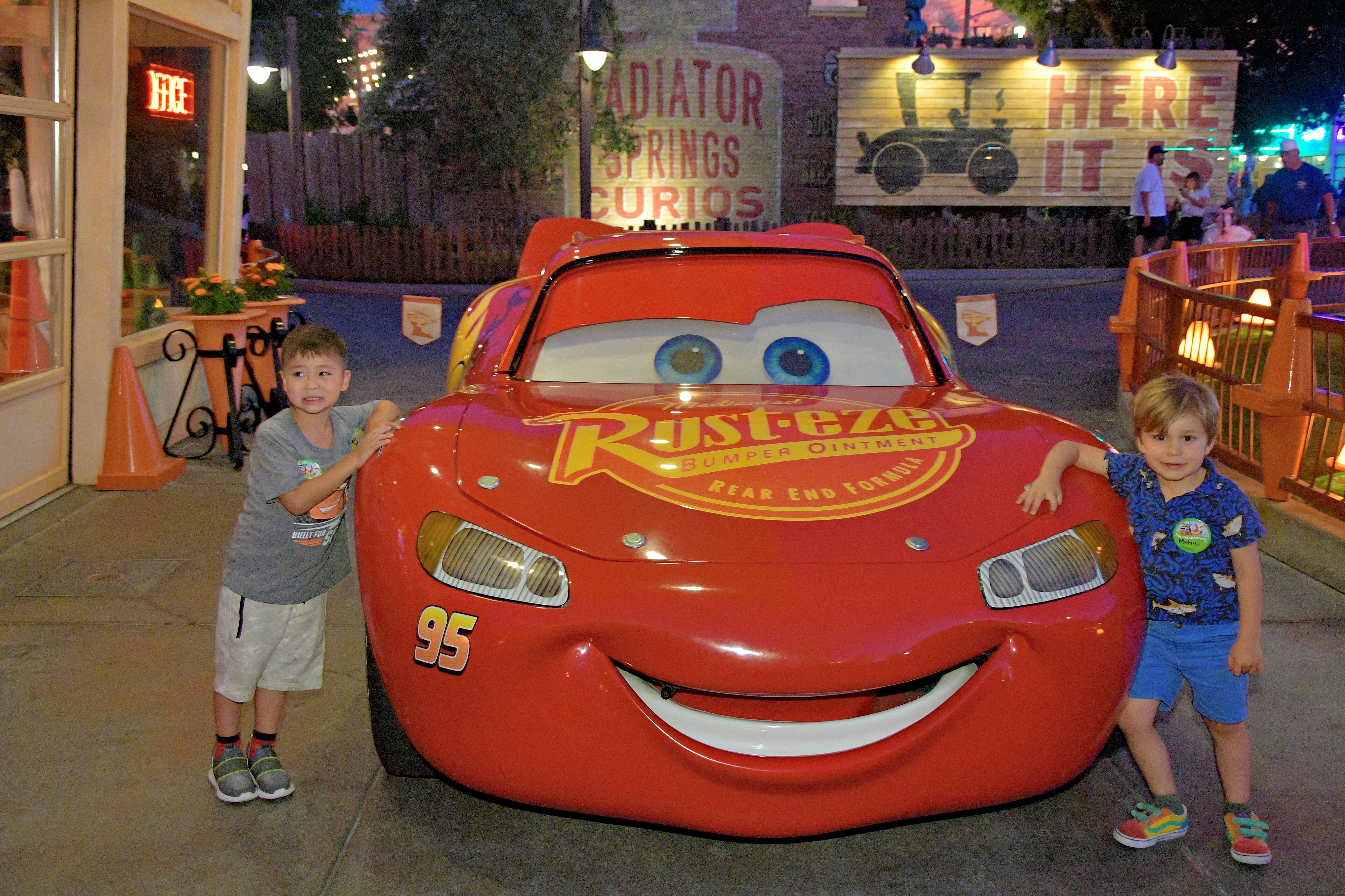 Img: shorts, boy, child, male, person, shoe, car, photography, face, portrait