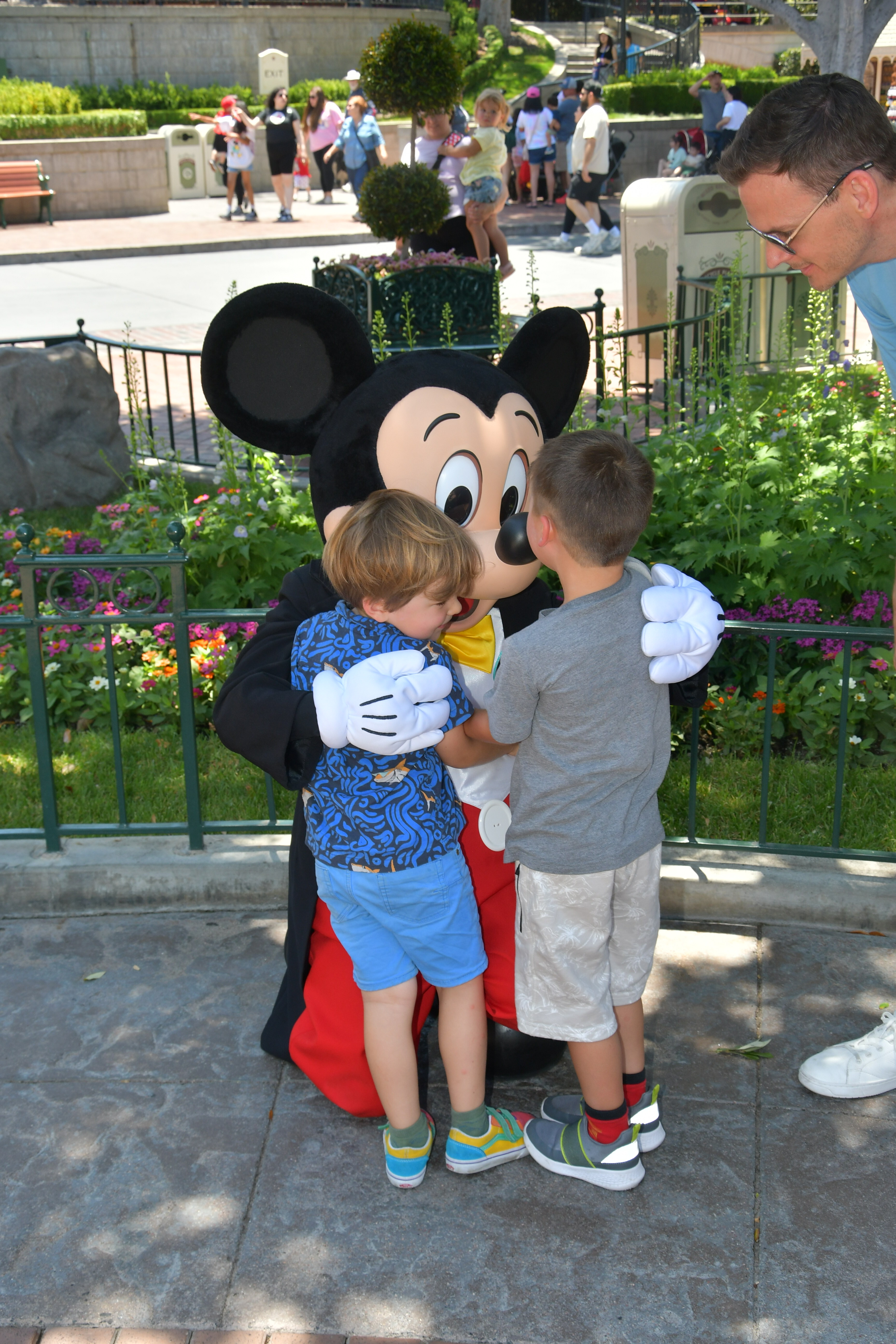 Img: glove, shorts, shoe, boy, child, male, person, glasses, adult, man