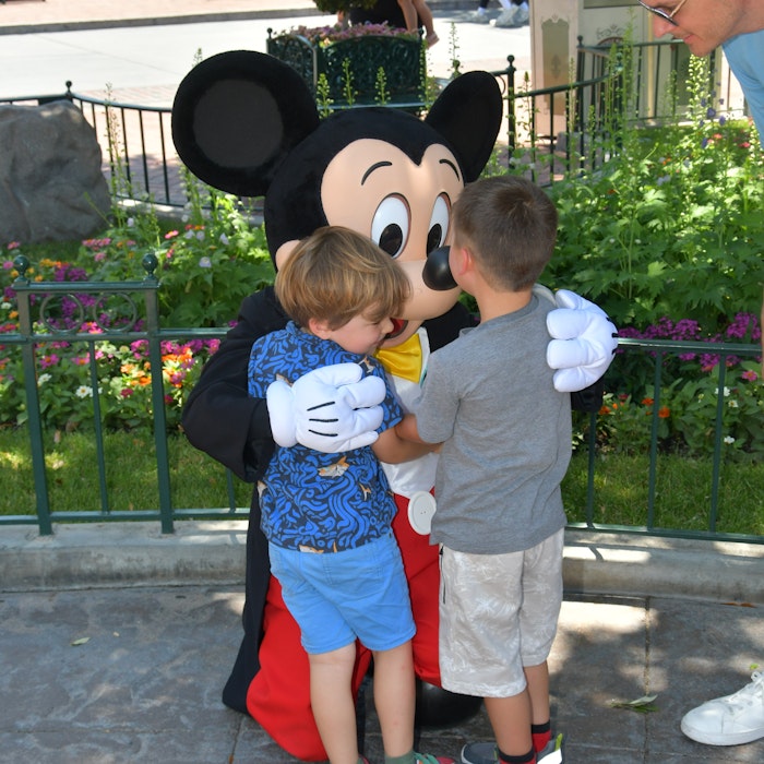 Img: glove, shorts, shoe, boy, child, male, person, glasses, adult, man