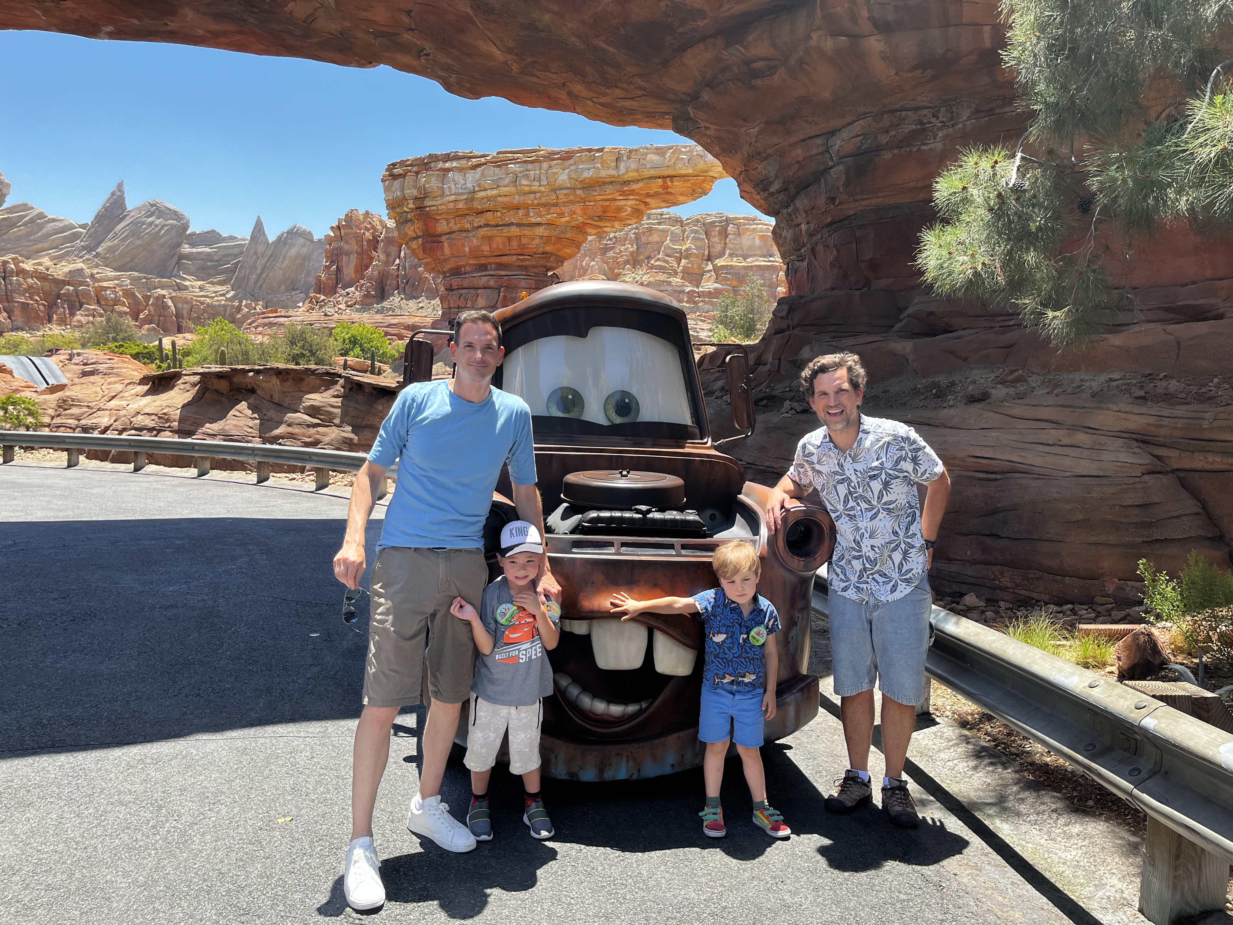 Img: shorts, rock, pants, shoe, adult, male, man, person, boy, child