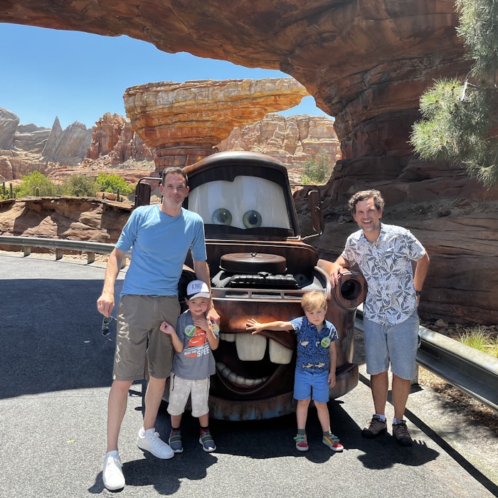 Img: shorts, rock, pants, shoe, adult, male, man, person, boy, child