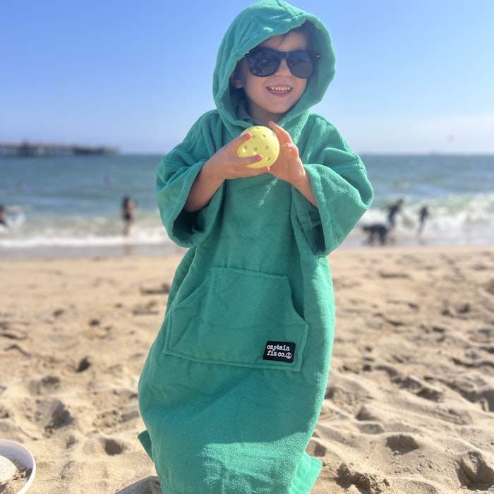 Img: clothing, coat, beachwear, photography, portrait, hoodie, beach, sea, hood, glasses