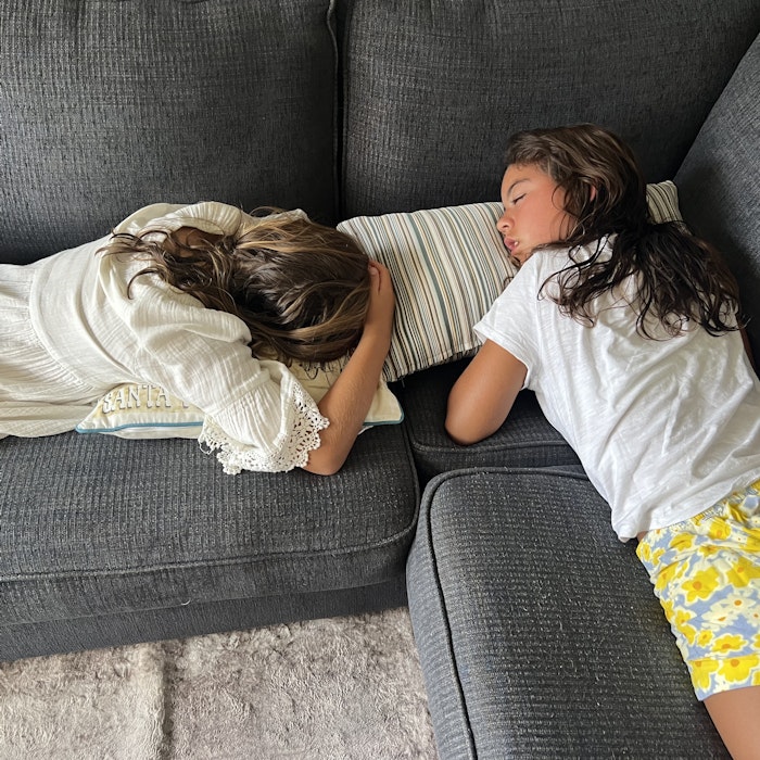 Img: child, female, girl, person, romantic, clothing, shorts, couch, furniture