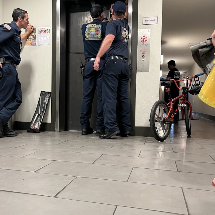 Img: floor, shoe, adult, male, man, person, bicycle, belt, handbag, wheel