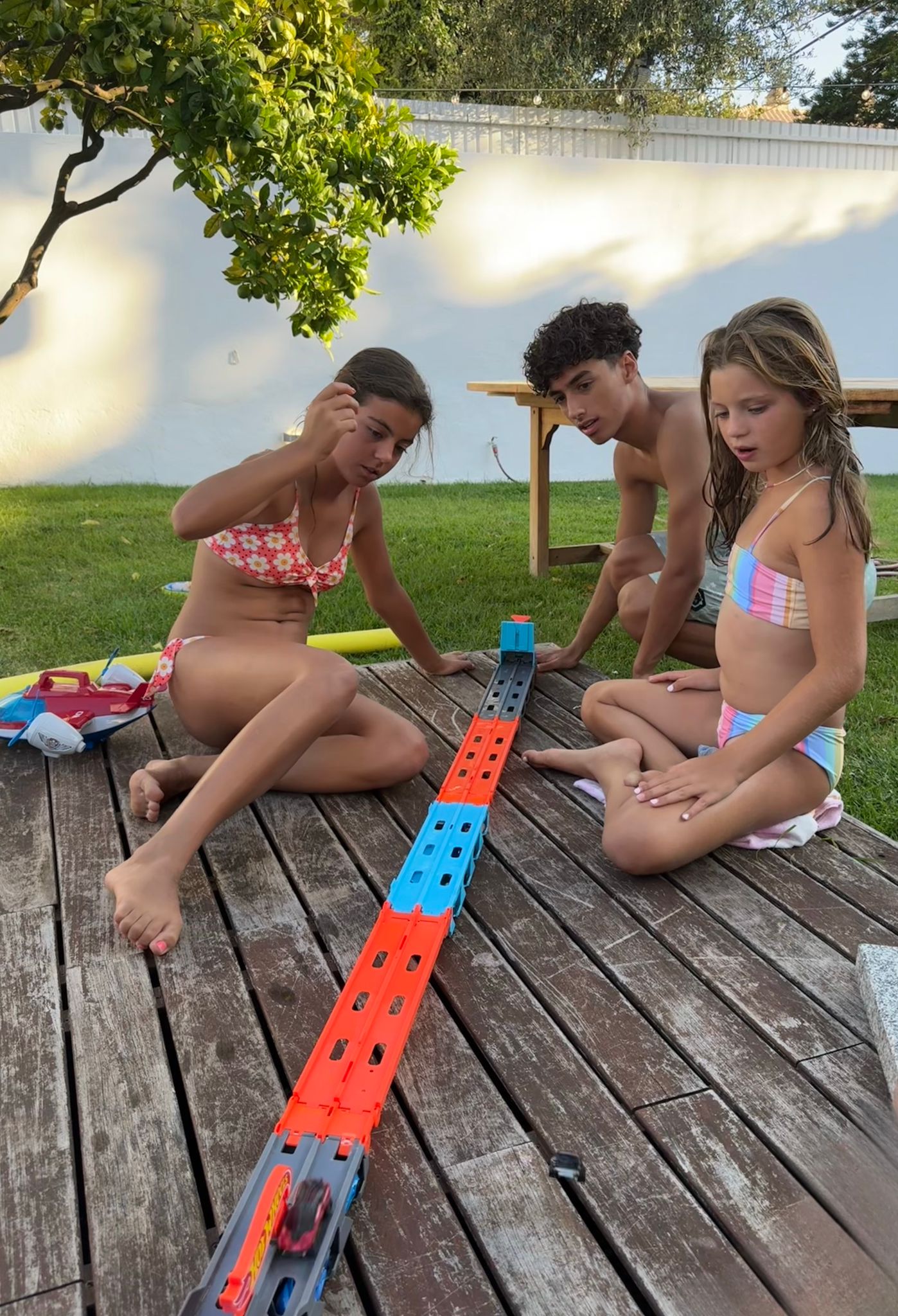 525331b6 4a9a 9bd7 4ddd86d0bc15: swimwear, summer, backyard, grass, bikini, person, boy, male, teen, portrait